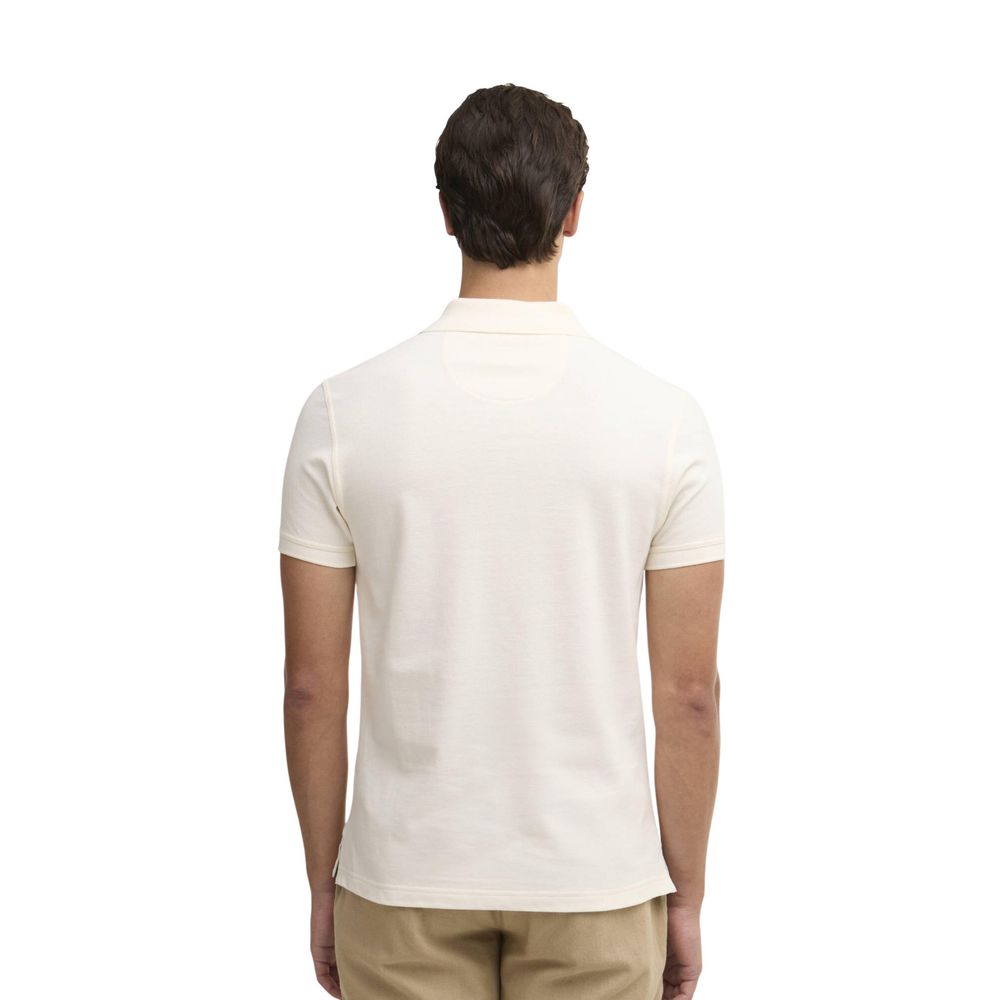 Elevate your style with the Barbour Cream Cotton Polo Shirt, a blend of luxurious craftsmanship and timeless elegance, perfect for the discerning individual.