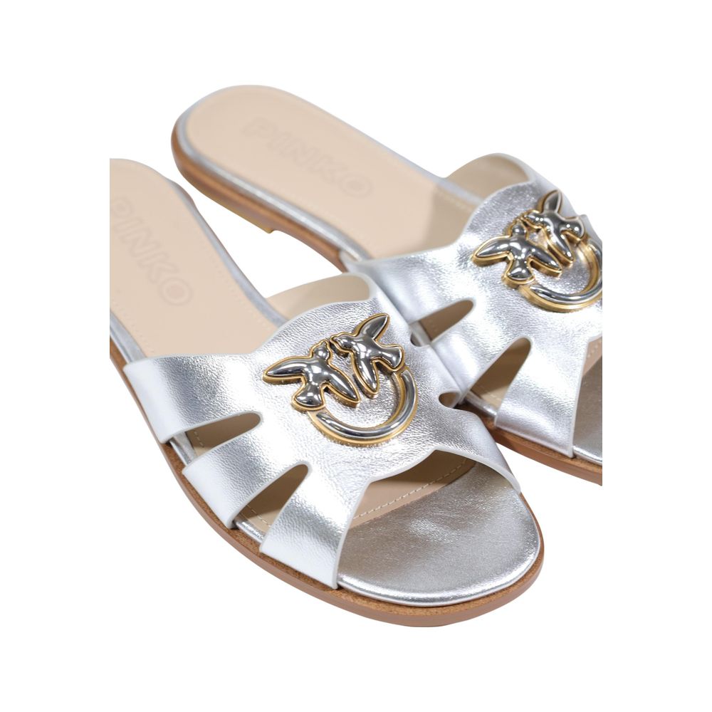 Elevate your summer elegance with PINKO White Leather Slippers, crafted from premium leather, embodying luxury and sophistication for every occasion.