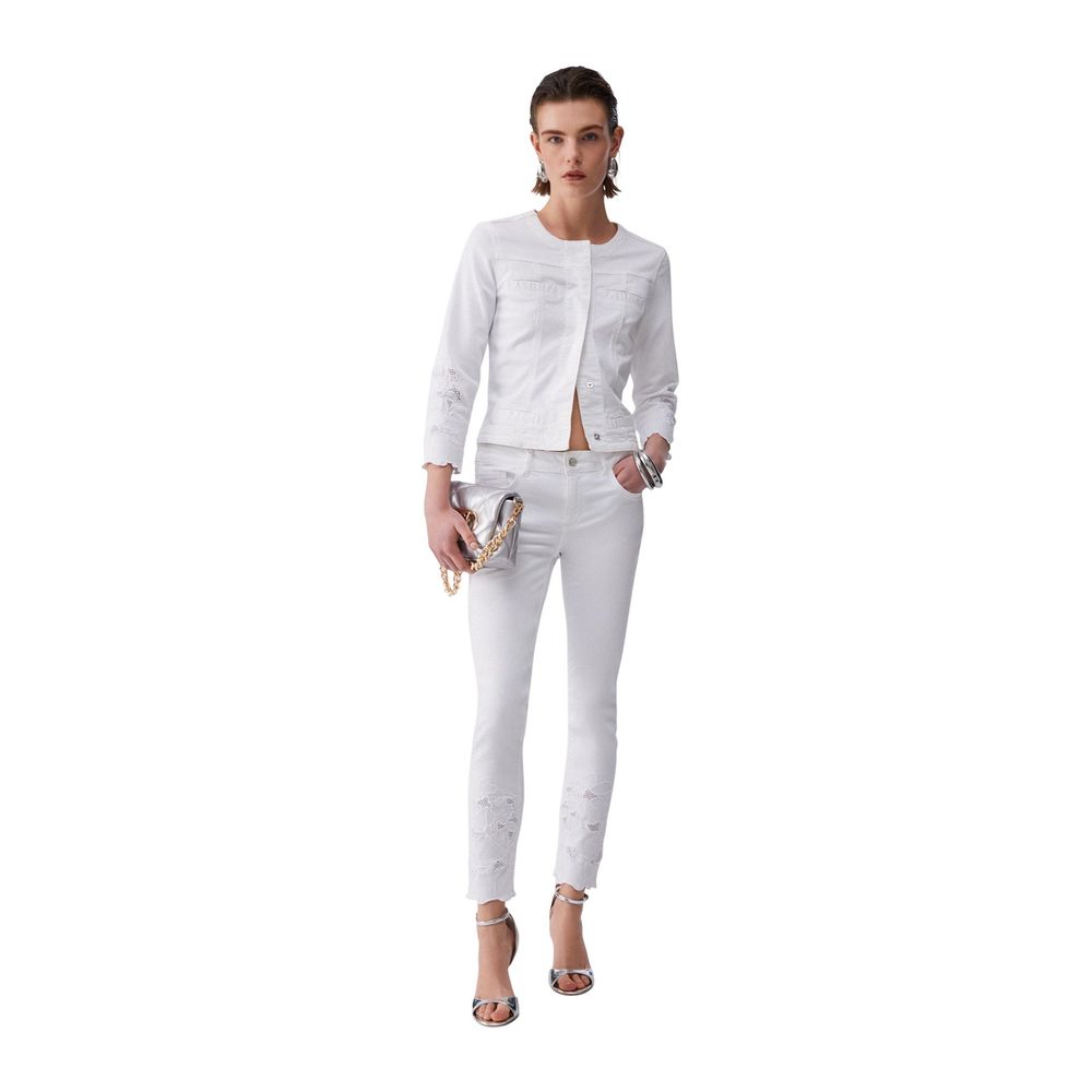 Indulge in the Liu Jo White Cotton Denim Jacket, a masterpiece of exquisite craftsmanship and floral elegance, perfect for elevating your sophisticated wardrobe.