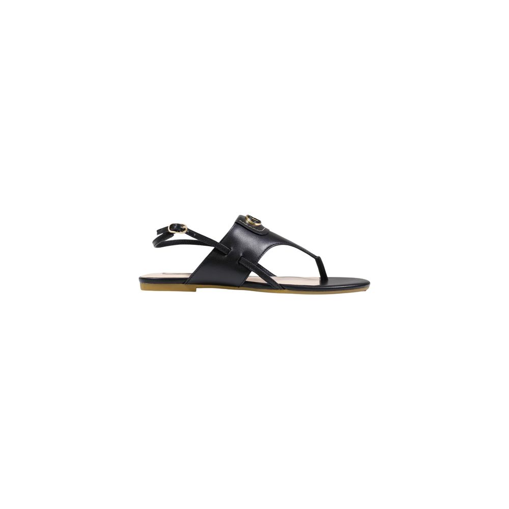 Elevate your style with Liu Jo Black Leather Flat Sandals, a masterpiece of minimalist elegance crafted from high-quality leather, perfect for discerning individuals.