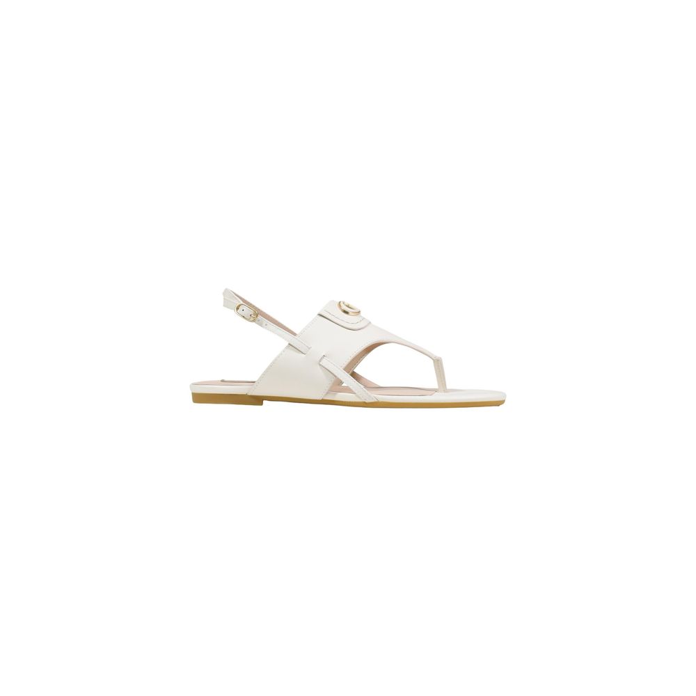 Indulge in the Liu Jo White Leather Flat Sandals, a masterpiece of minimalist design crafted from high-quality leather, perfect for elevating any elegant occasion.