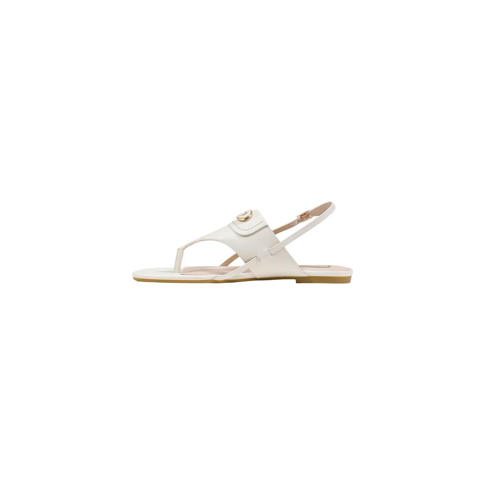 Step into a realm of elegance with Liu Jo White Leather Flat Sandals, where exquisite craftsmanship meets minimalist design, perfect for the discerning individual.