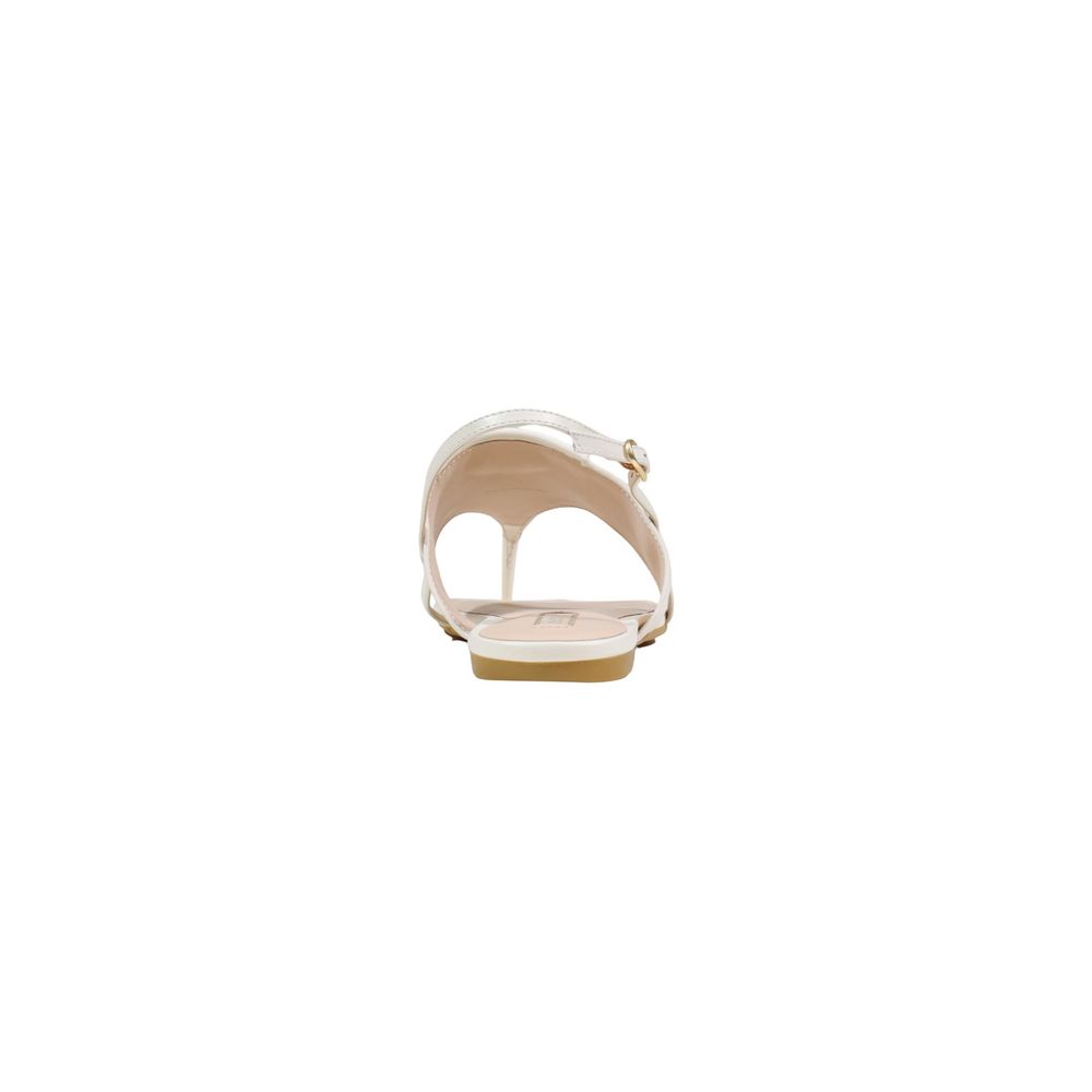 Indulge in the Liu Jo White Leather Flat Sandals, where minimalist design meets exquisite craftsmanship, embodying timeless elegance for the discerning individual.