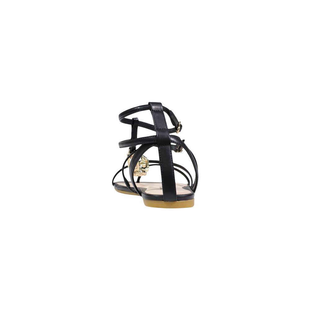 Experience the exquisite Liu Jo Black Polyethylene Flat Sandals, where luxurious craftsmanship meets timeless elegance, perfect for the discerning individual.