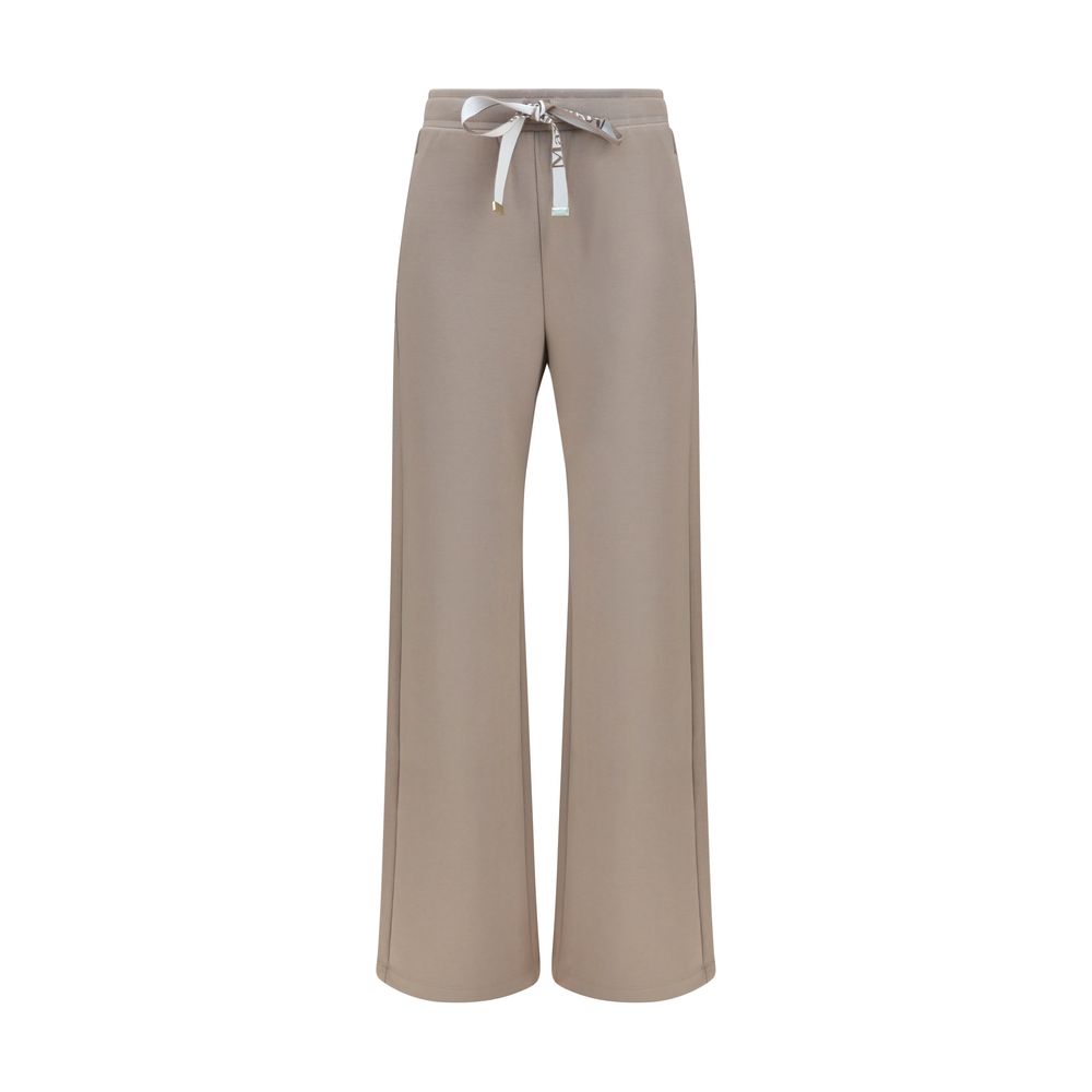 Elevate your wardrobe with 'S Max Mara Beige Cotton Casual Pants, crafted from soft double jersey for effortless elegance. Experience luxury that transcends time.