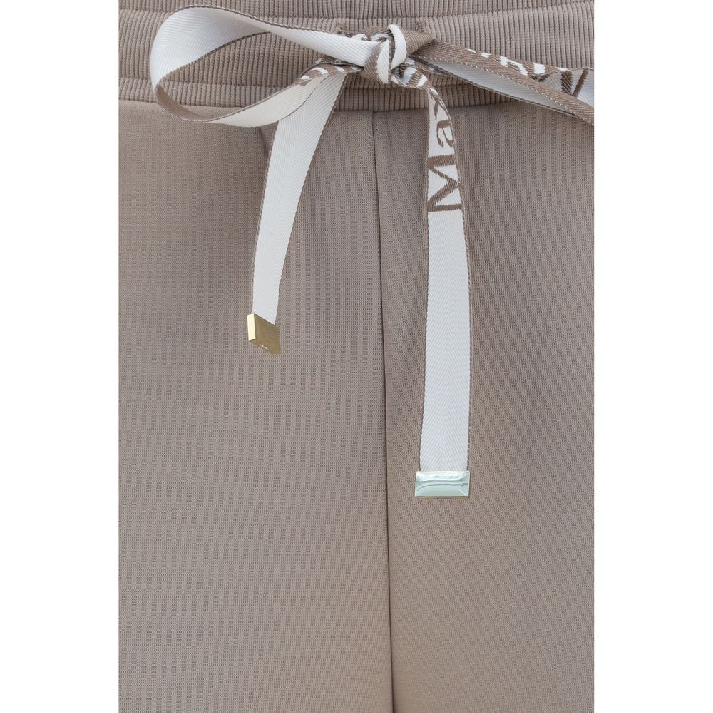 Indulge in the luxurious elegance of 'S Max Mara Beige Cotton Casual Pants, crafted from soft double jersey for a refined silhouette that elevates any occasion.