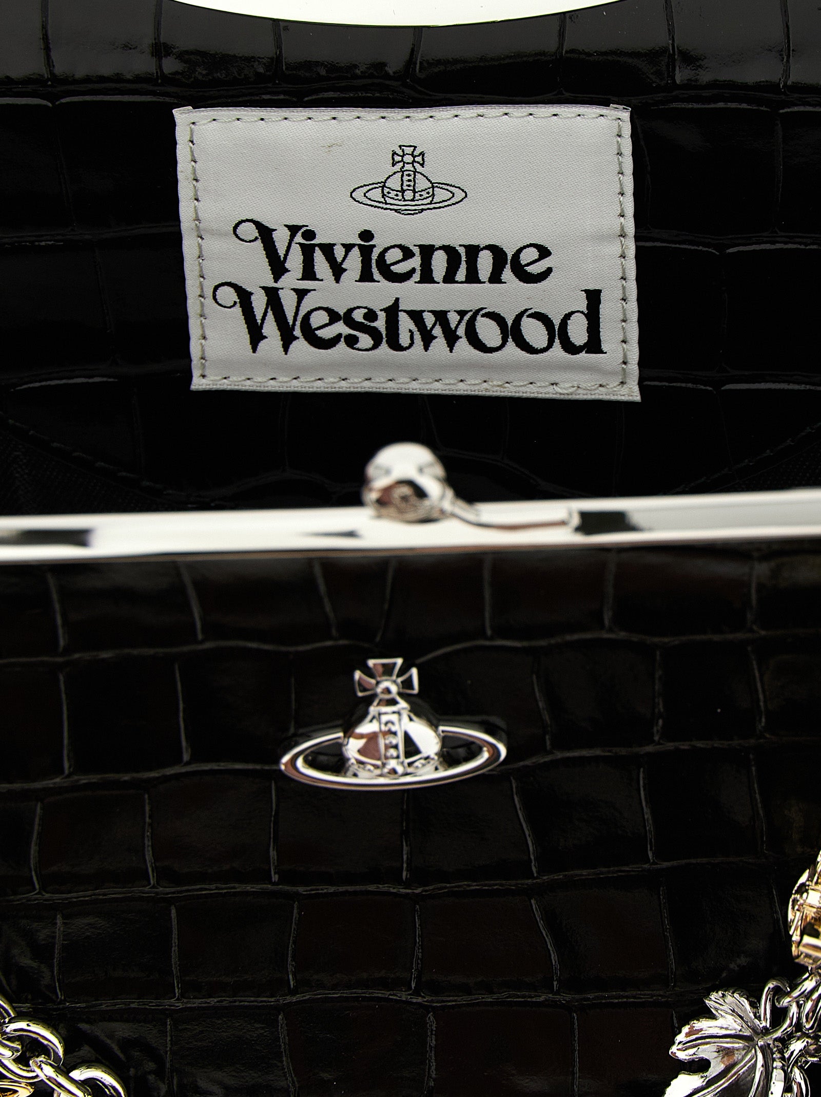 Indulge in the allure of the Vivienne Westwood Charm Frame shoulder bag, a timeless blend of luxurious calfskin and sophisticated design, perfect for the discerning individual.