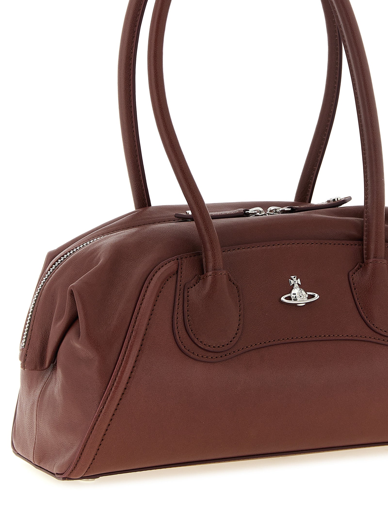 Indulge in the exquisite Vivienne Westwood Brown Calfskin Shoulder Bag, a masterpiece of Italian craftsmanship that embodies timeless elegance and bold sophistication.