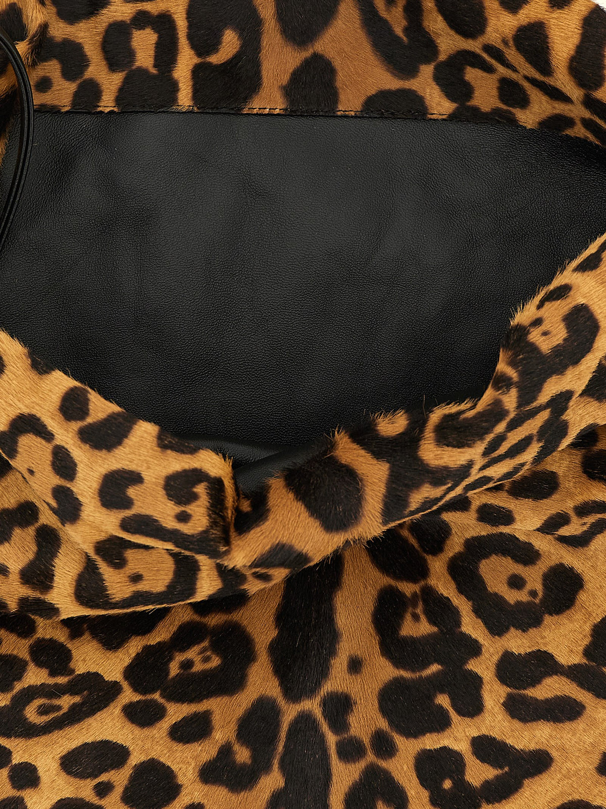 Indulge in the audacious allure of the Saint Laurent Amalia medium shoulder bag, crafted from luxurious calfskin leather with a striking leopard print, perfect for the discerning fashion connoisseur.