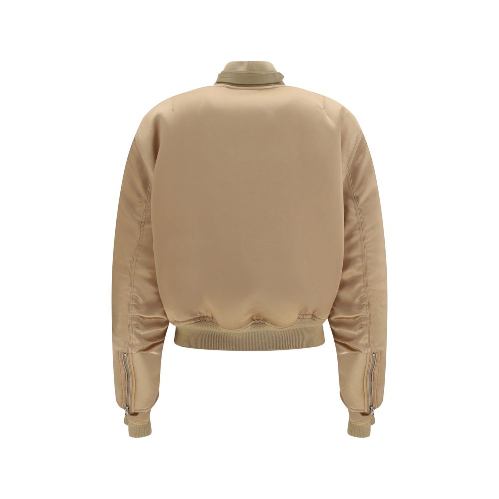 Elevate your style with the Tom Ford Gold Satin Bomber, a luxurious fusion of silk satin and leather, embodying sophistication and modern elegance for the discerning individual.