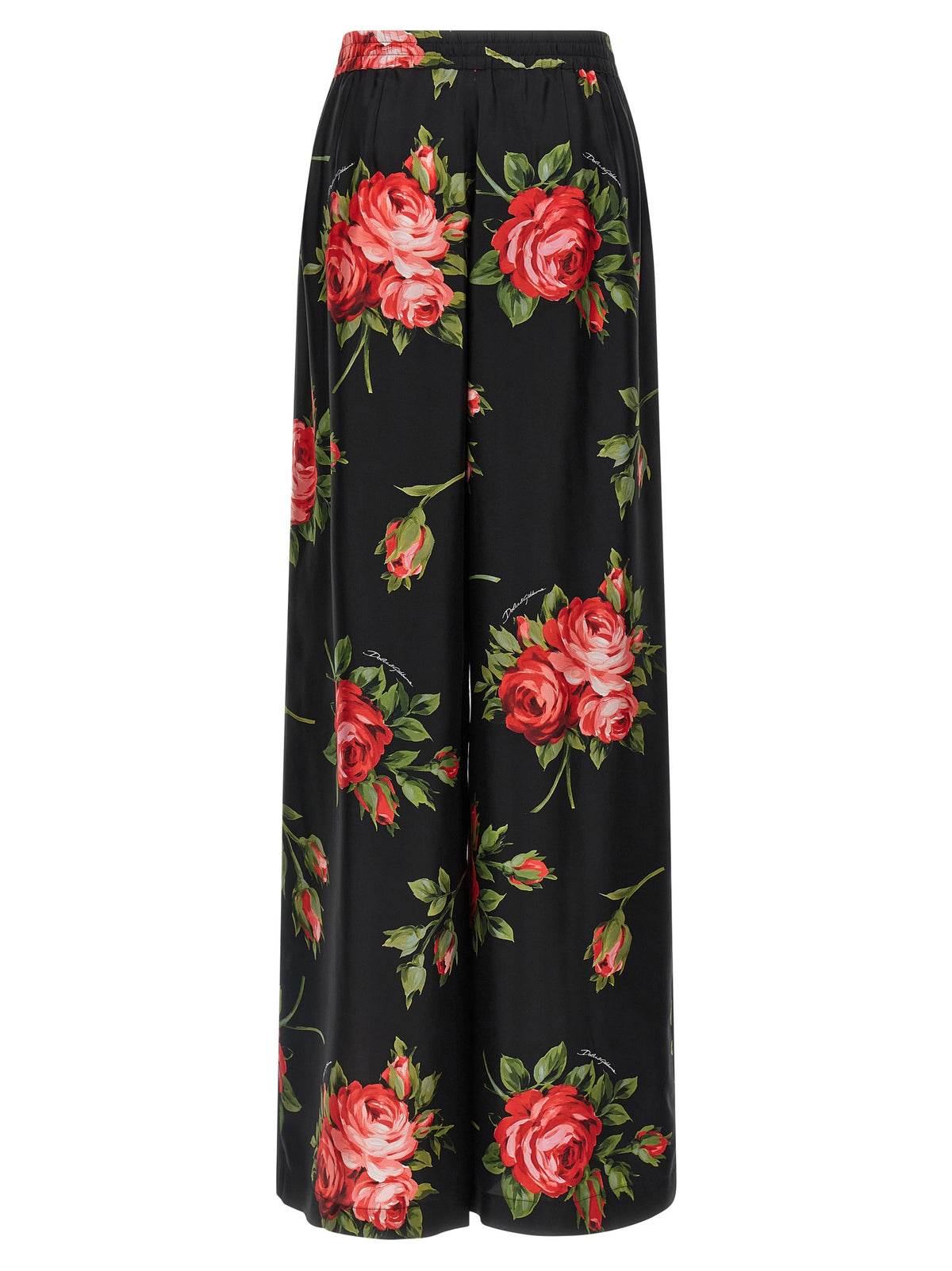 Indulge in the exquisite allure of Dolce & Gabbana Black Silk Pants, handcrafted in Italy from sumptuous silk, embodying luxury and sophistication for the discerning individual.