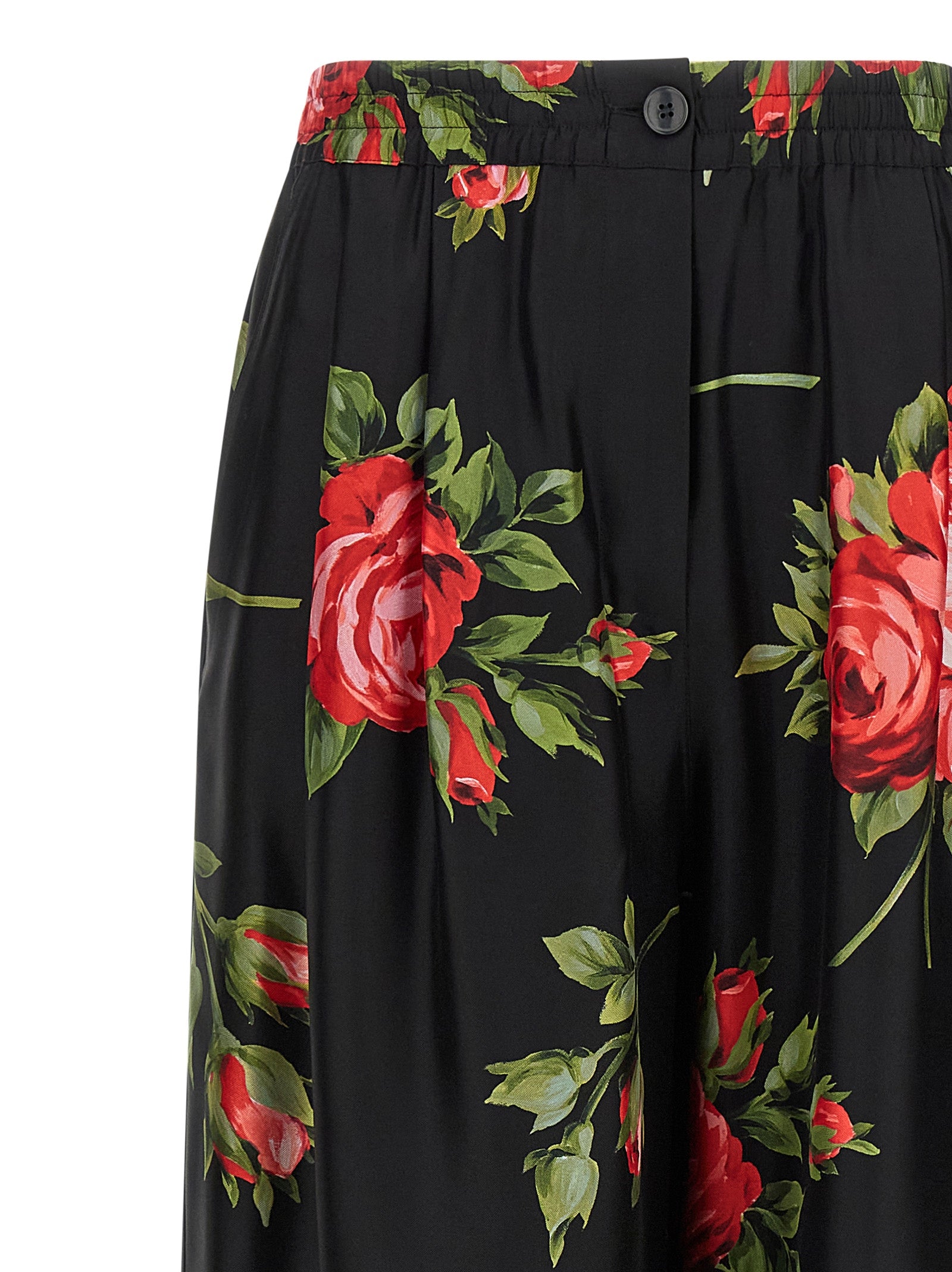 Discover the exquisite Dolce & Gabbana Black Silk Pants, a handcrafted masterpiece in luxurious silk, embodying elegance and sophistication for the discerning individual.
