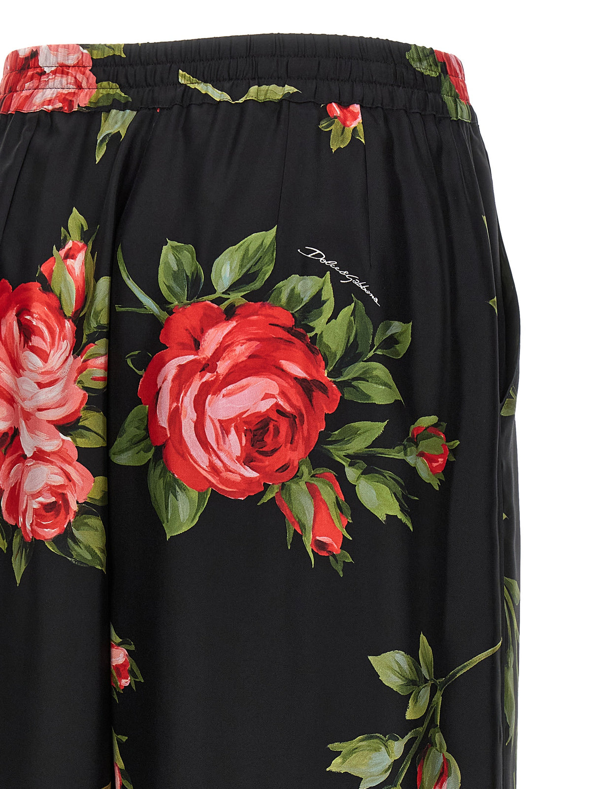 Indulge in the exquisite allure of Dolce & Gabbana Black Silk Pants, handcrafted in Italy with luxurious silk, embodying elegance and sophistication for the discerning fashion connoisseur.