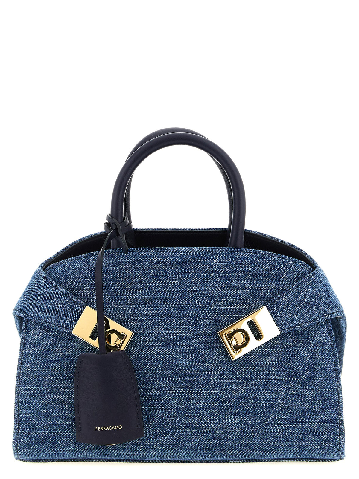 Experience the allure of the Ferragamo Hug (XS) handbag, a masterpiece of Italian craftsmanship in luxurious blue fabric and calf leather, perfect for discerning tastes.