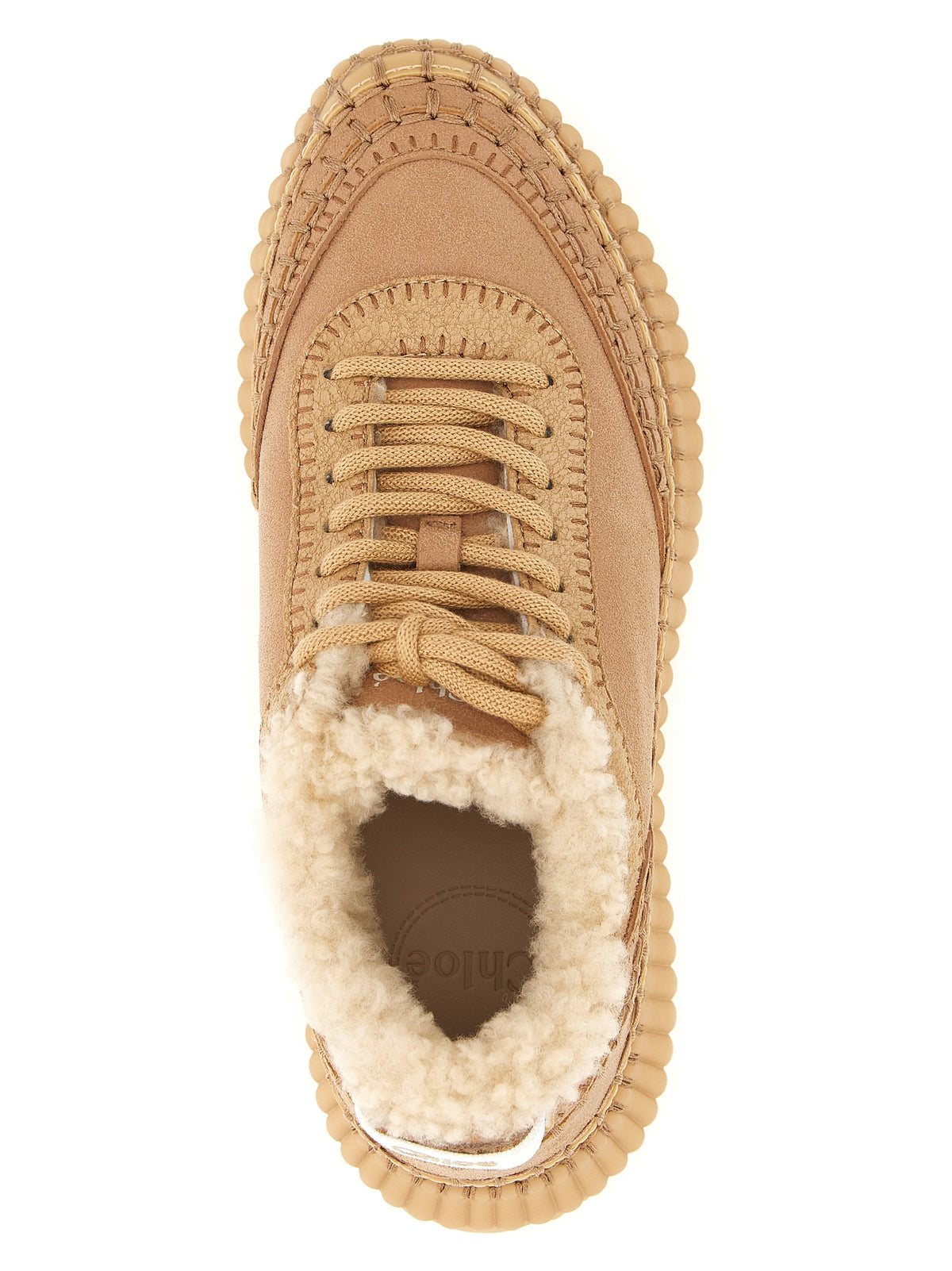 Step into a realm of elegance with Chloé's Beige Lambskin Chunky Sneakers, where luxurious craftsmanship meets sustainable sophistication for the discerning individual.