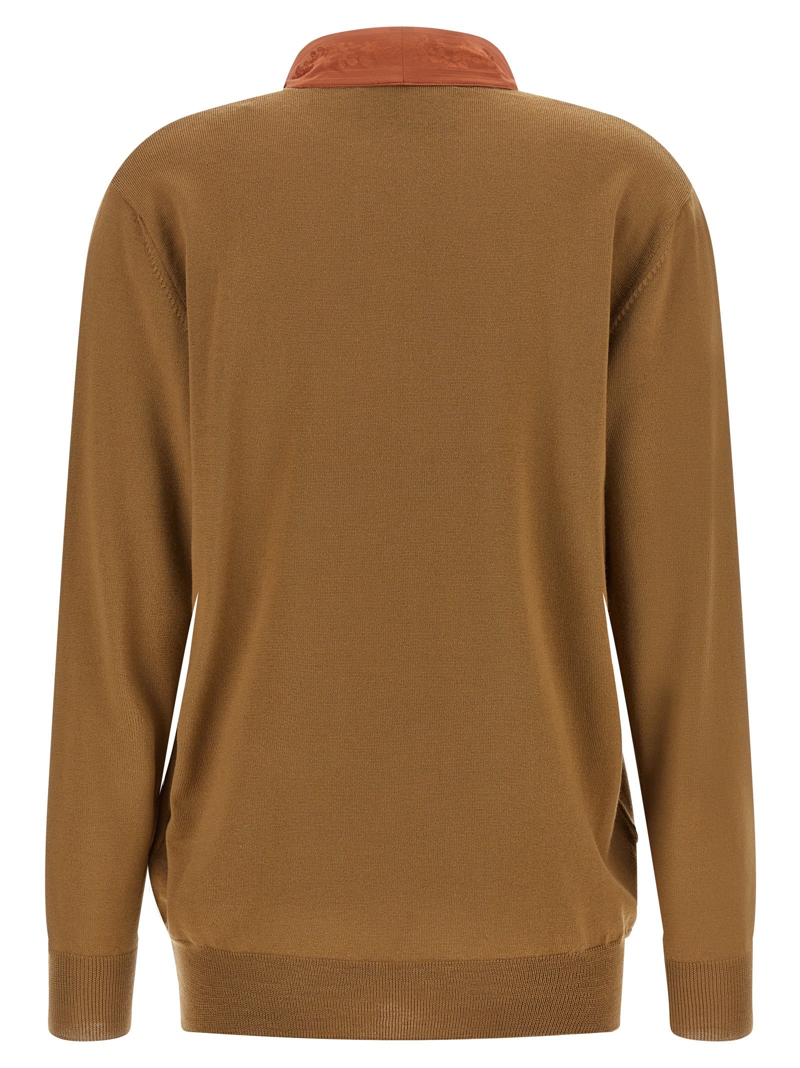 Indulge in the exquisite Valentino Garavani Brown Cashmere Cardigan, a timeless piece of luxurious knitwear that embodies superior craftsmanship and chic elegance.