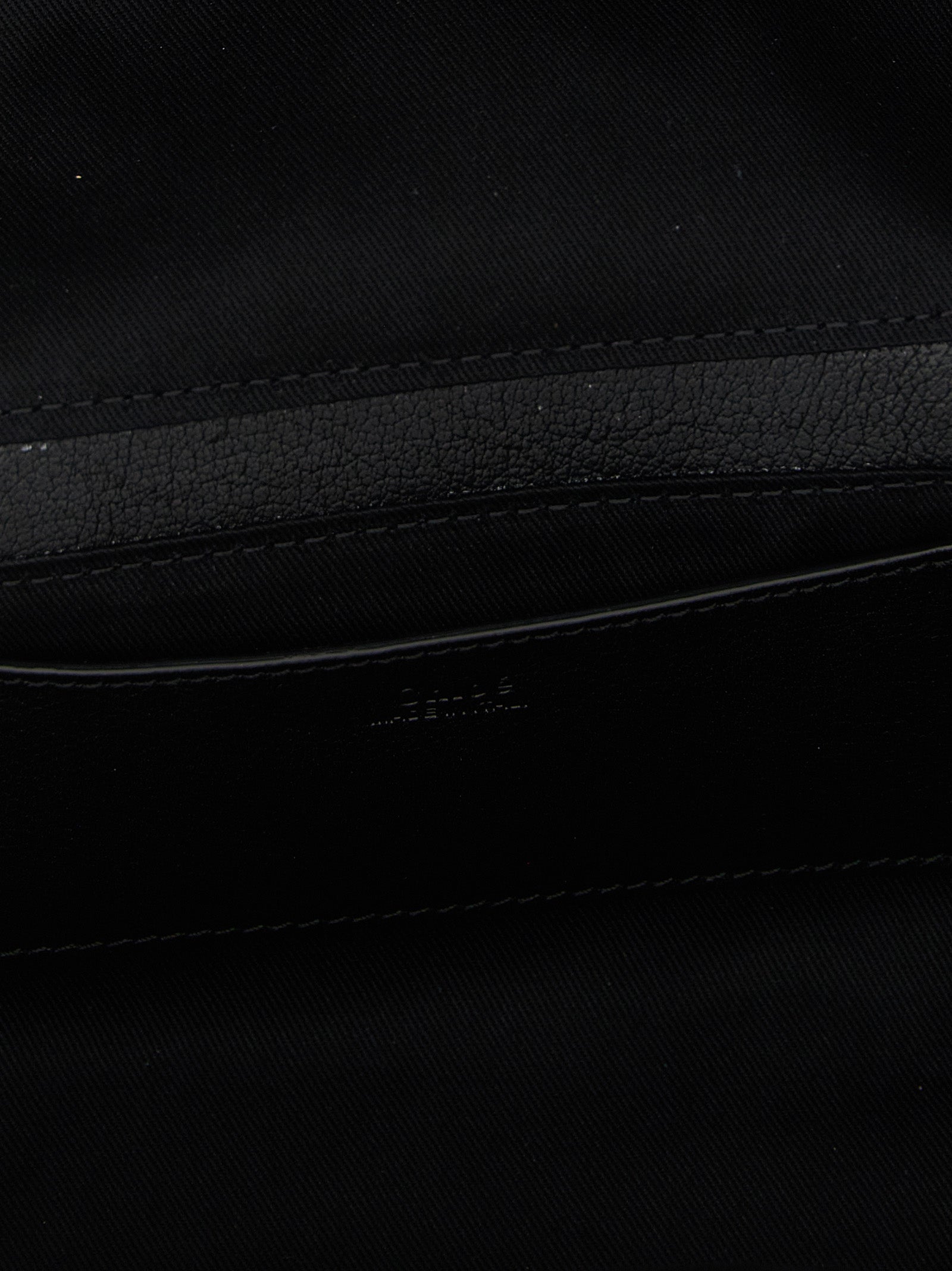 Discover the Chloé Black Buffalo Leather Shoulder Bag, a masterpiece of Italian craftsmanship that embodies luxury and sophistication, perfect for the discerning individual.