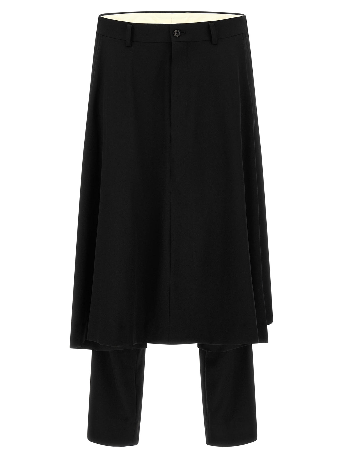 Experience the avant-garde elegance of Comme des Garçons Homme Plus trousers, crafted from pure black wool, merging bold design with timeless sophistication for the discerning individual.