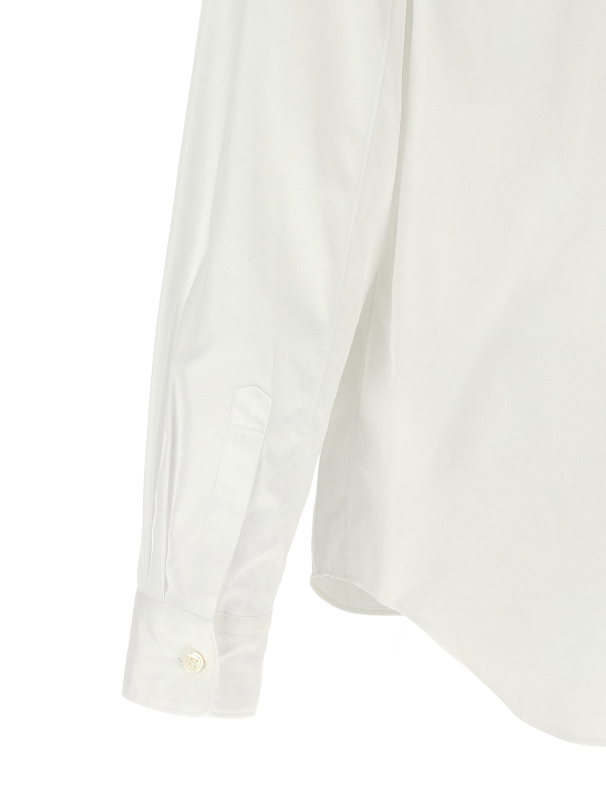 Elevate your wardrobe with the Comme Des Garçons White Cotton Blouse, where avant-garde design meets exquisite craftsmanship for a statement of timeless sophistication.