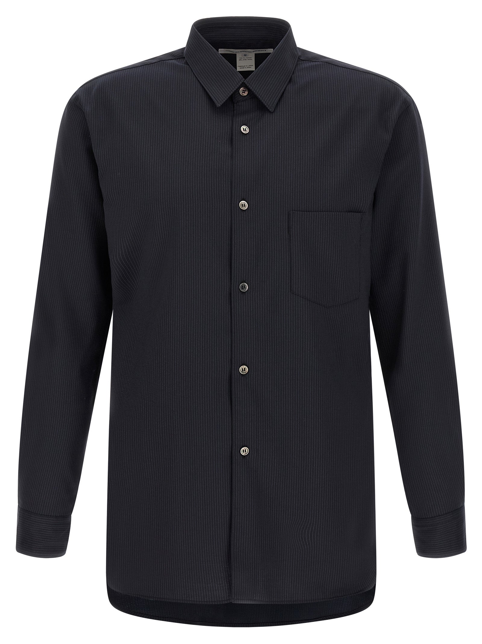 Elevate your elegance with the Comme Des Garçons Blue Polyester Blouse, a masterful blend of sophistication and modernity, perfect for the discerning wardrobe.