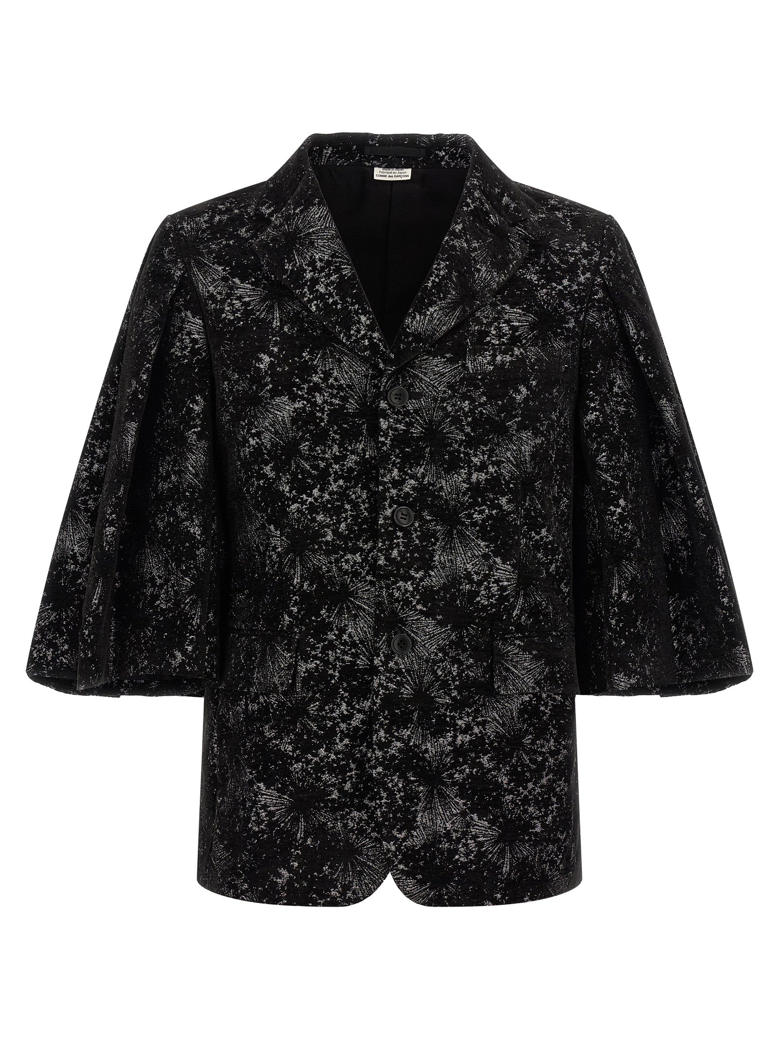 Discover the Comme Des Garçons Black Polyester Blazer, a masterpiece of avant-garde design and craftsmanship, perfect for those who embrace luxury and individuality.