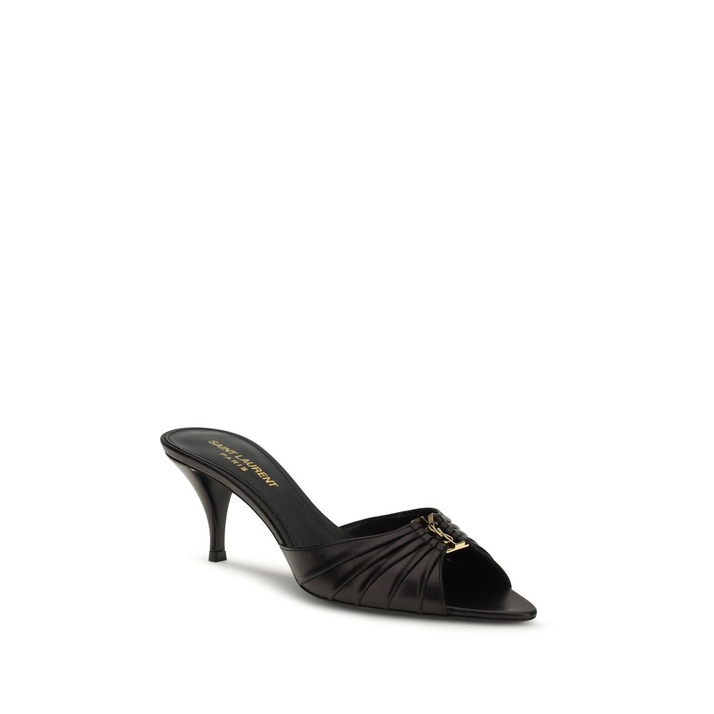 Experience the exquisite allure of Saint Laurent's Black Calf Leather Bos Taurus Sandals from the AW26 collection, where luxurious craftsmanship meets timeless elegance.