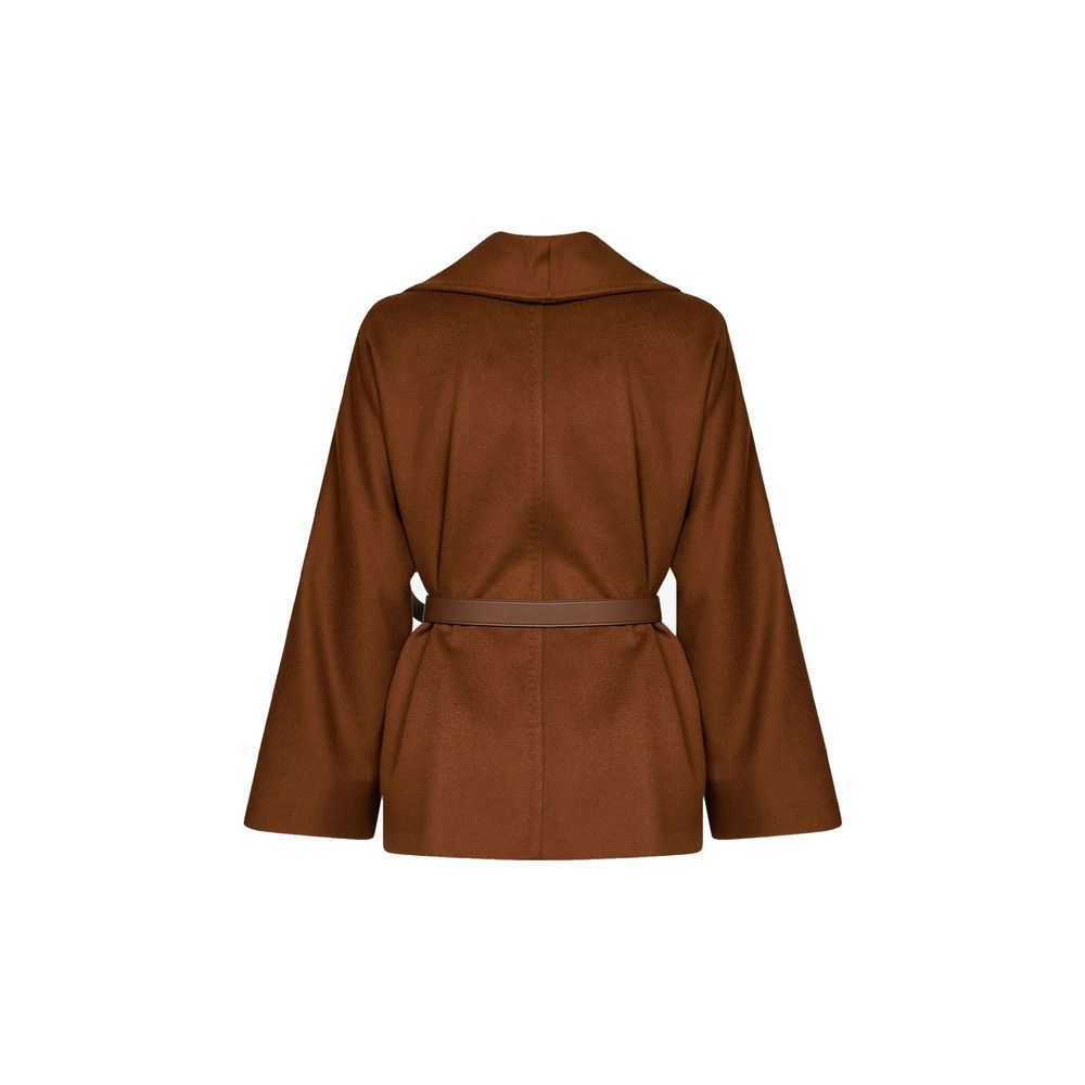 Indulge in the exquisite Max Mara Brown Virgin Wool Jacket, a timeless piece of luxurious craftsmanship that embodies elegance and sophistication for the discerning individual.