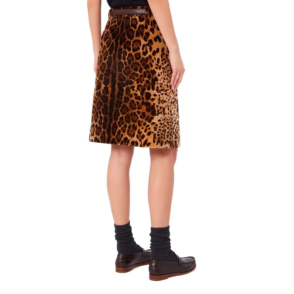 Elevate your wardrobe with the Max Mara Brown Cotton Midi Skirt, a luxurious blend of smooth velvet and chic leopard print, epitomizing modern elegance and timeless allure.