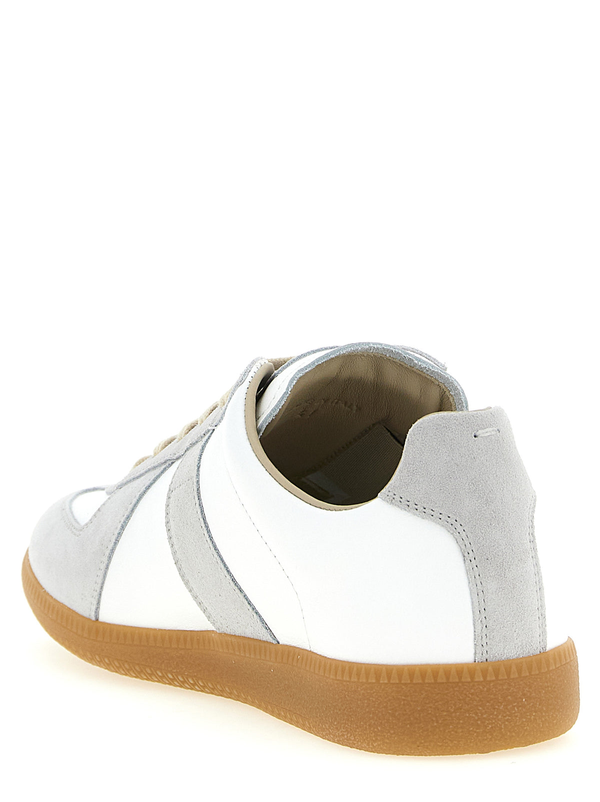 Discover the Maison Margiela White Calfskin Sneakers, where exquisite craftsmanship meets timeless elegance, elevating every step with luxurious comfort and style.