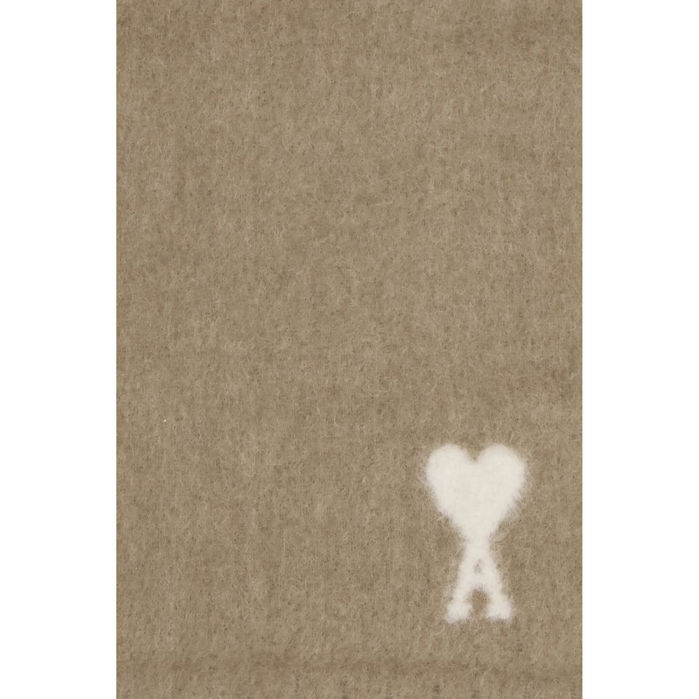 Experience the exquisite warmth of the Ami Paris Beige Alpaca Vicugna Pacos Scarf, a luxurious blend of alpaca and polyamide, designed for timeless elegance and sophisticated style.