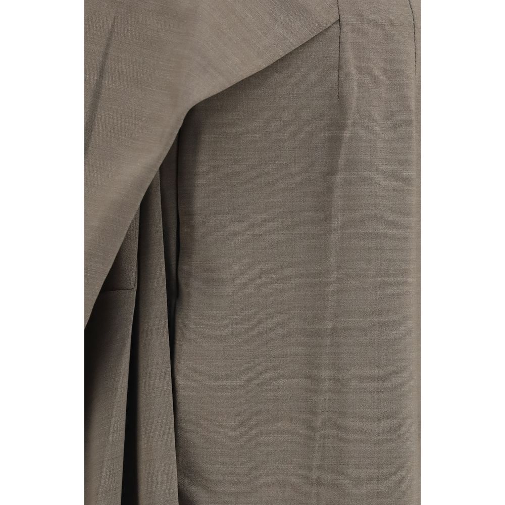 Elevate your wardrobe with Jacquemus Gray Wool Oves Aries Flared Pants, crafted from luxurious fleece wool for a sophisticated silhouette that commands attention.