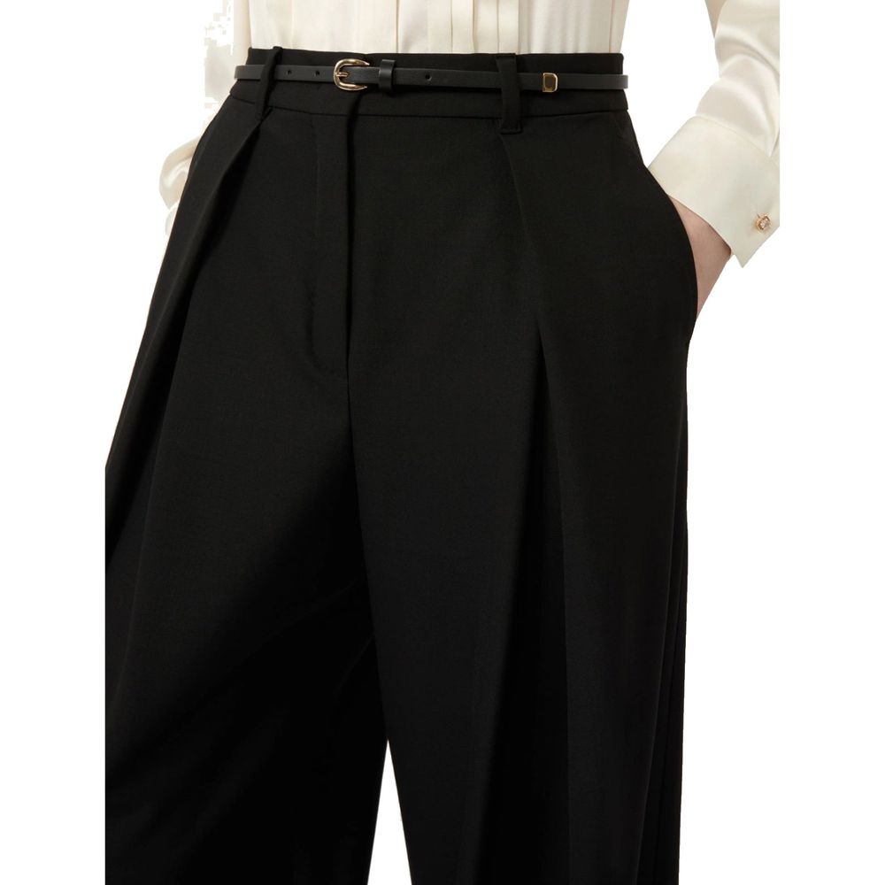 Indulge in the exquisite Max Mara Black Elastane Casual Pants, crafted from luxurious virgin wool, embodying sophistication and tailored elegance for the discerning individual.