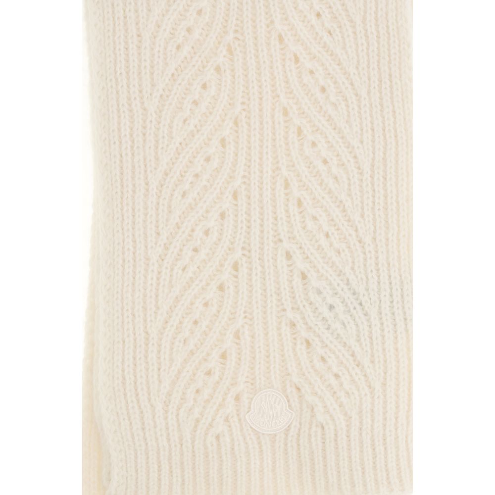 Indulge in the Moncler Beige Wool Oves Aries Foulard, a luxurious blend of alpaca and cashmere, exuding warmth and elegance for the discerning connoisseur.
