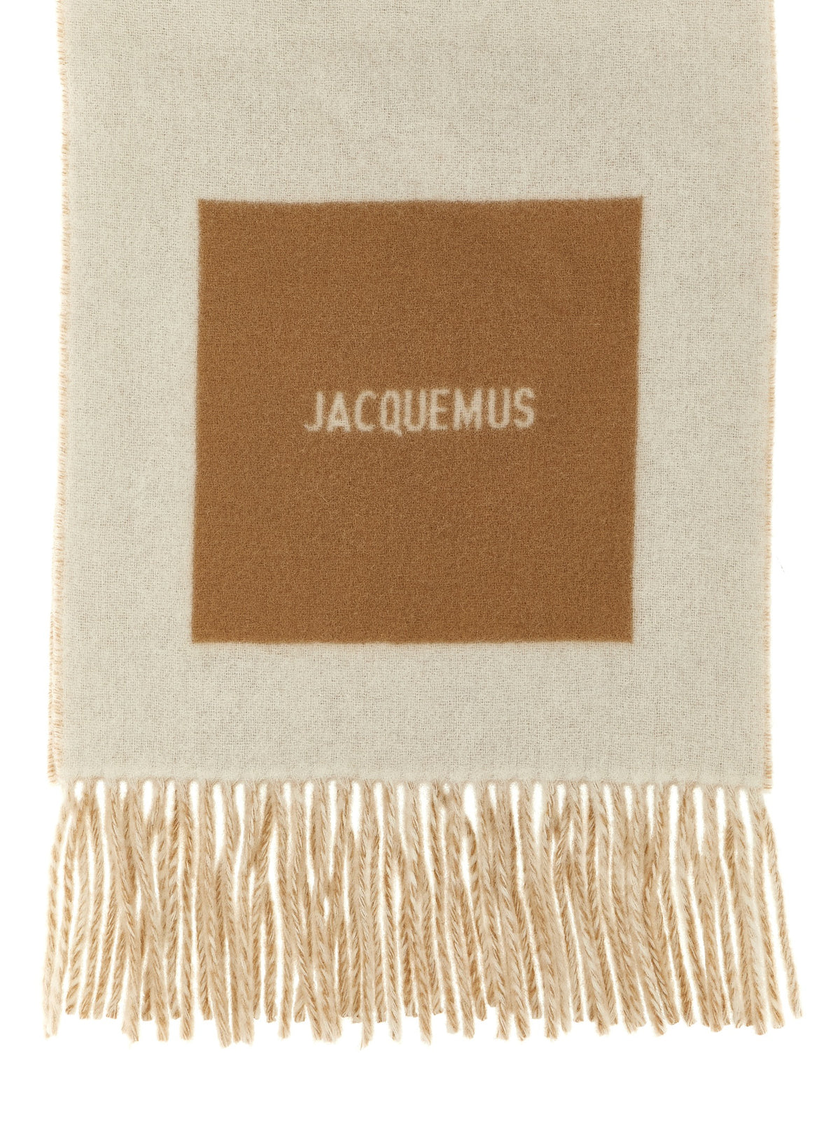 Indulge in the exquisite Jacquemus Beige Virgin Wool Foulard, a luxurious accessory crafted from 100% virgin wool, embodying timeless elegance and sophisticated allure.