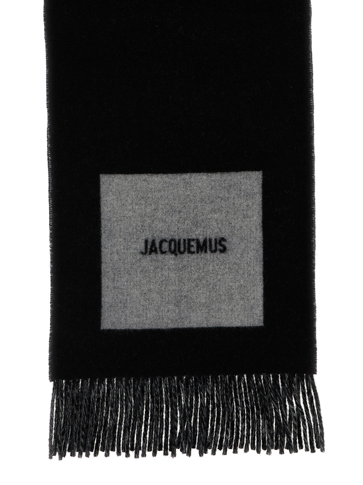 Elevate your style with the Jacquemus Multicolor Virgin Wool Foulard, a luxurious masterpiece of intricate inlays and playful fringes, embodying artistry and elegance.