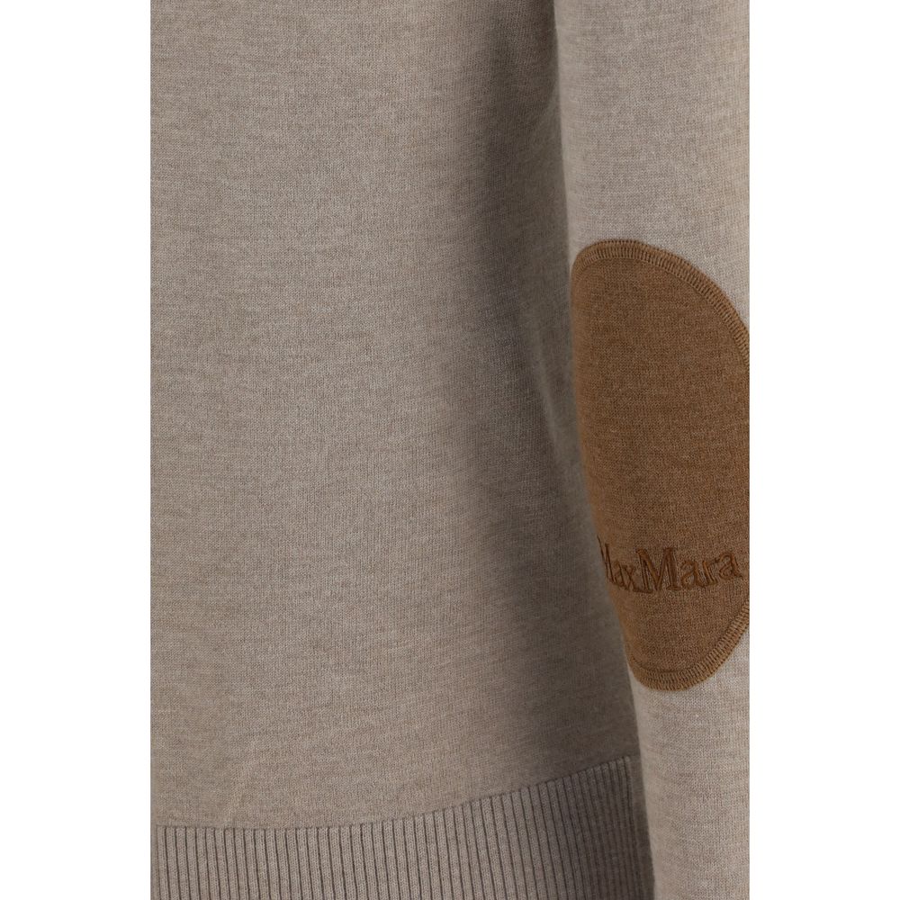 Elevate your wardrobe with the 'S Max Mara Beige Wool Oves Aries Turtleneck, a luxurious fleece wool piece that embodies timeless elegance and sophisticated allure.