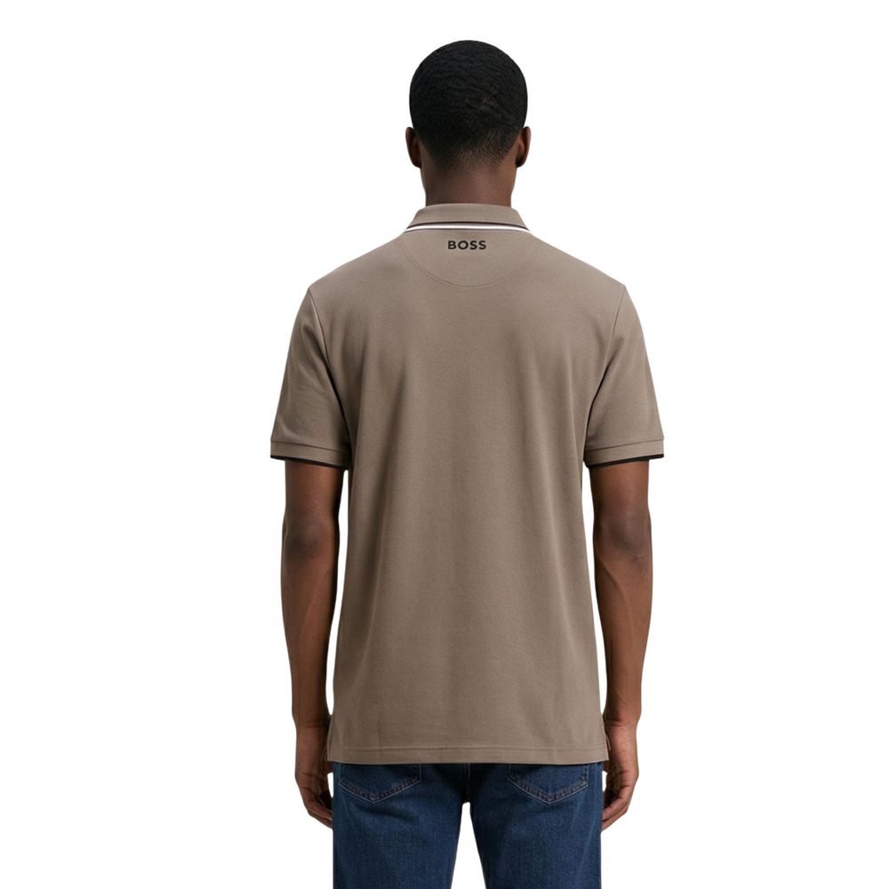 Indulge in the refined elegance of the Hugo Boss Beige Cotton Polo Shirt, a perfect blend of comfort and sophistication, ideal for both casual and upscale occasions.