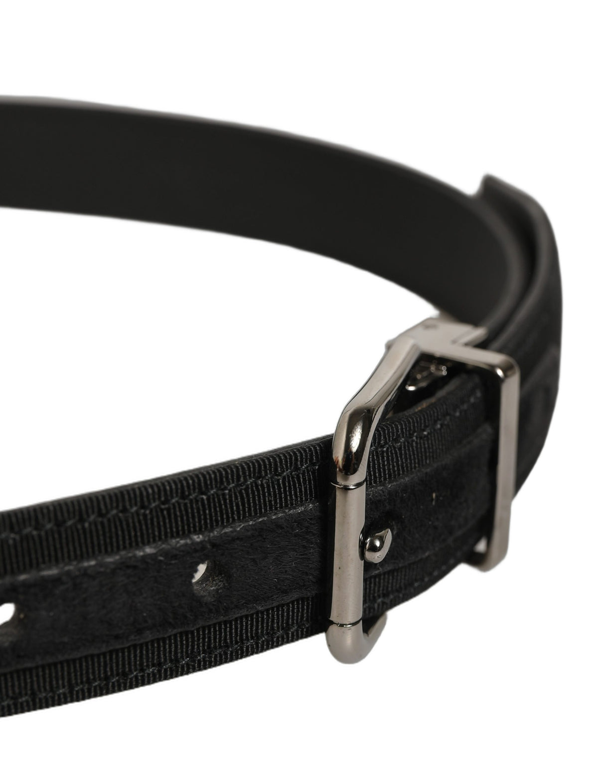 Indulge in the exquisite allure of the Dolce & Gabbana Black Classic Leather Belt, a testament to Italian craftsmanship that elevates any ensemble with its timeless elegance.