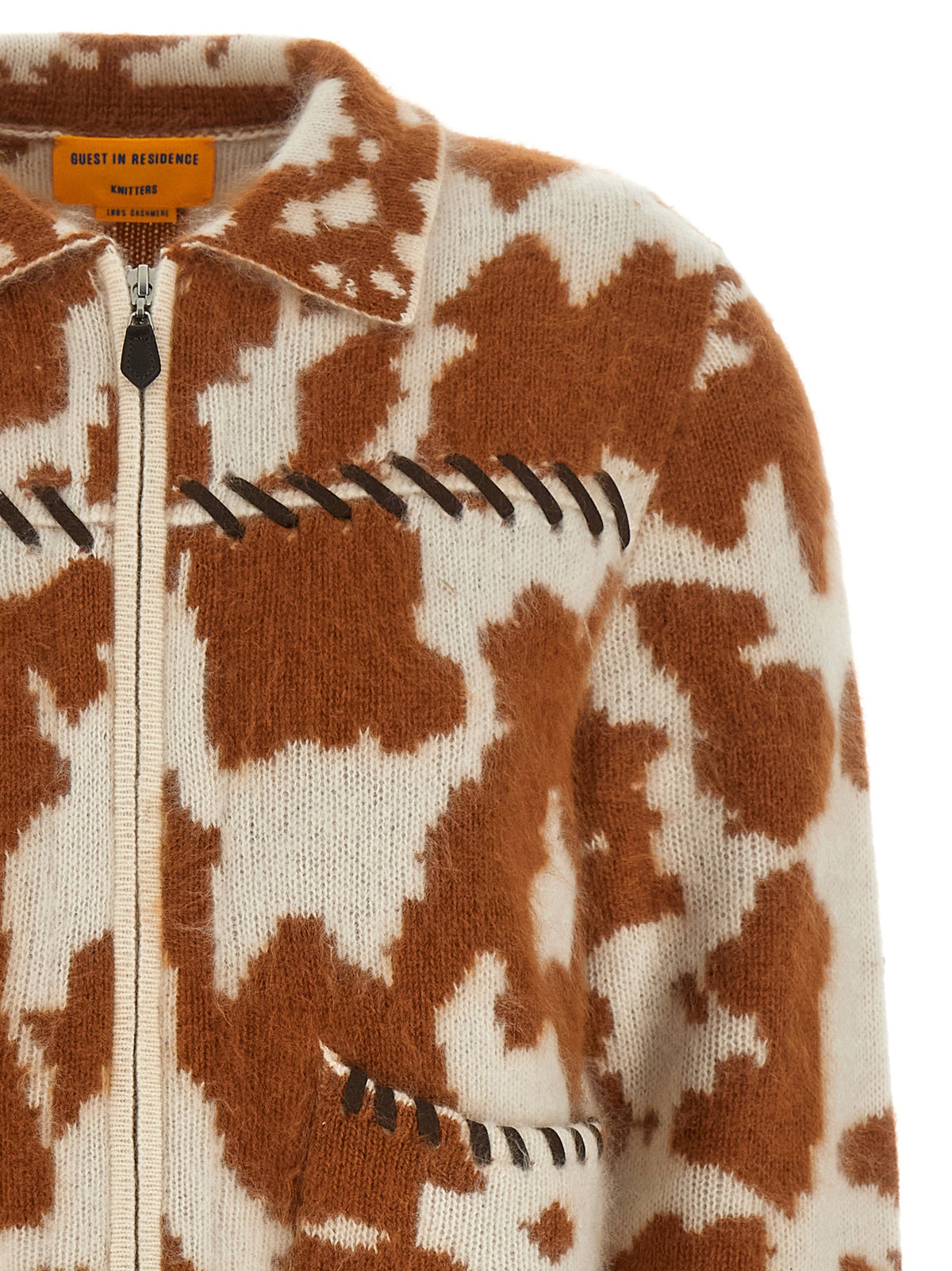 Indulge in the exquisite craftsmanship of the Guest in Residence Brown Cashmere Full-Length Jacket, a luxurious statement piece that redefines elegance and sophistication.