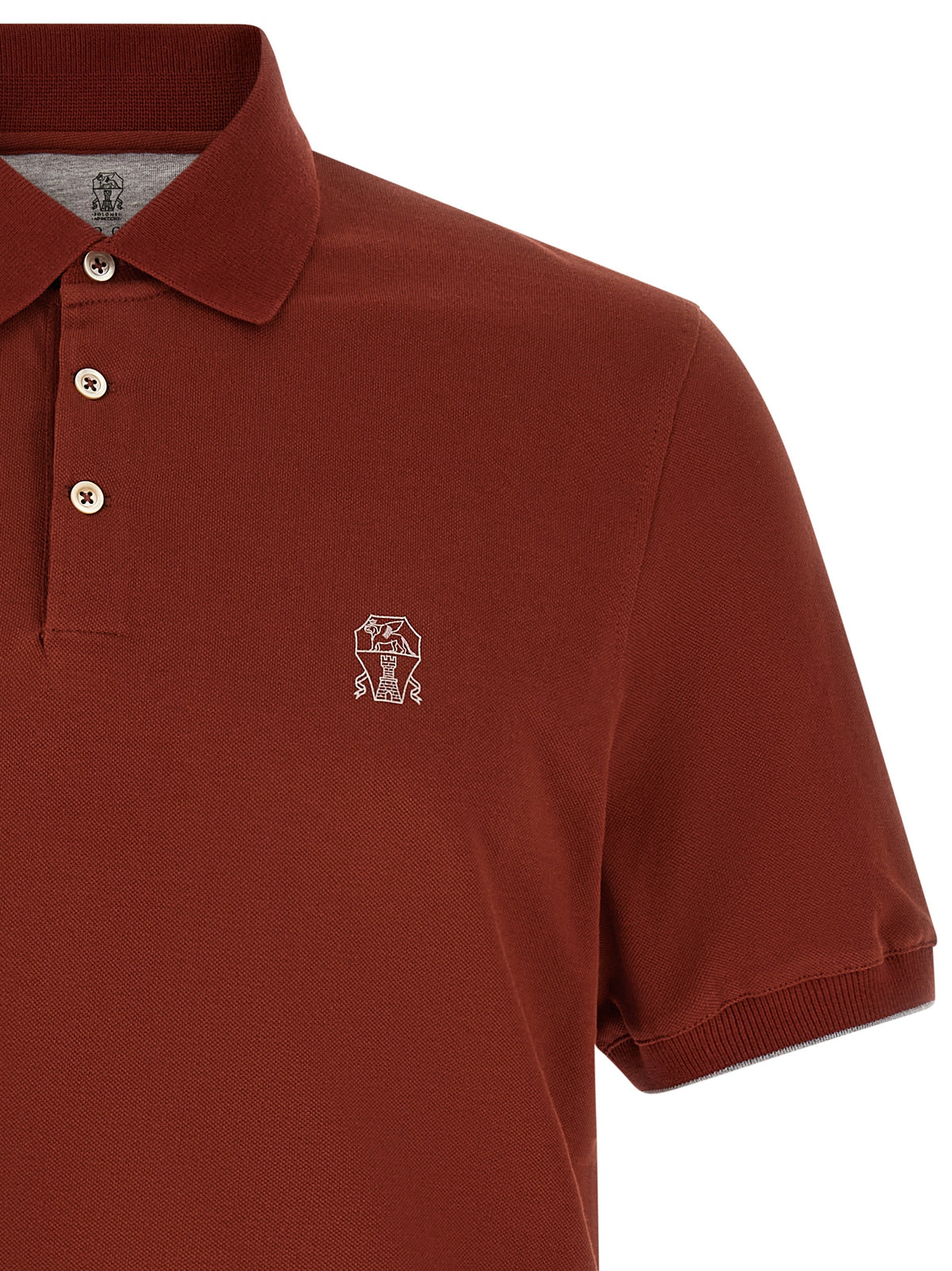 Elevate your wardrobe with the Brunello Cucinelli Red Cotton Polo Shirt, a masterpiece of Italian craftsmanship that embodies refined luxury and timeless elegance.