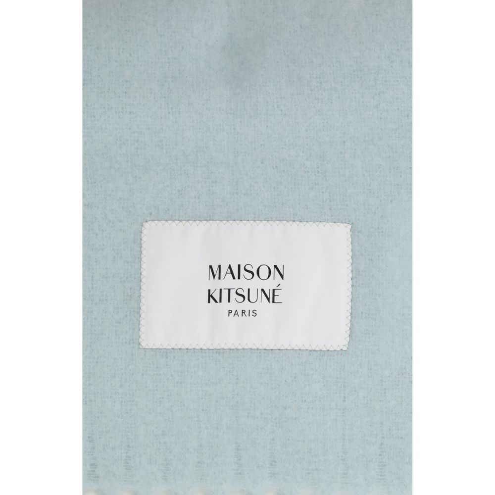 Indulge in the Maison Kitsuné Blue Polyamide Scarf, a luxurious blend of alpaca and polyamide, redefining elegance and warmth for the discerning individual.