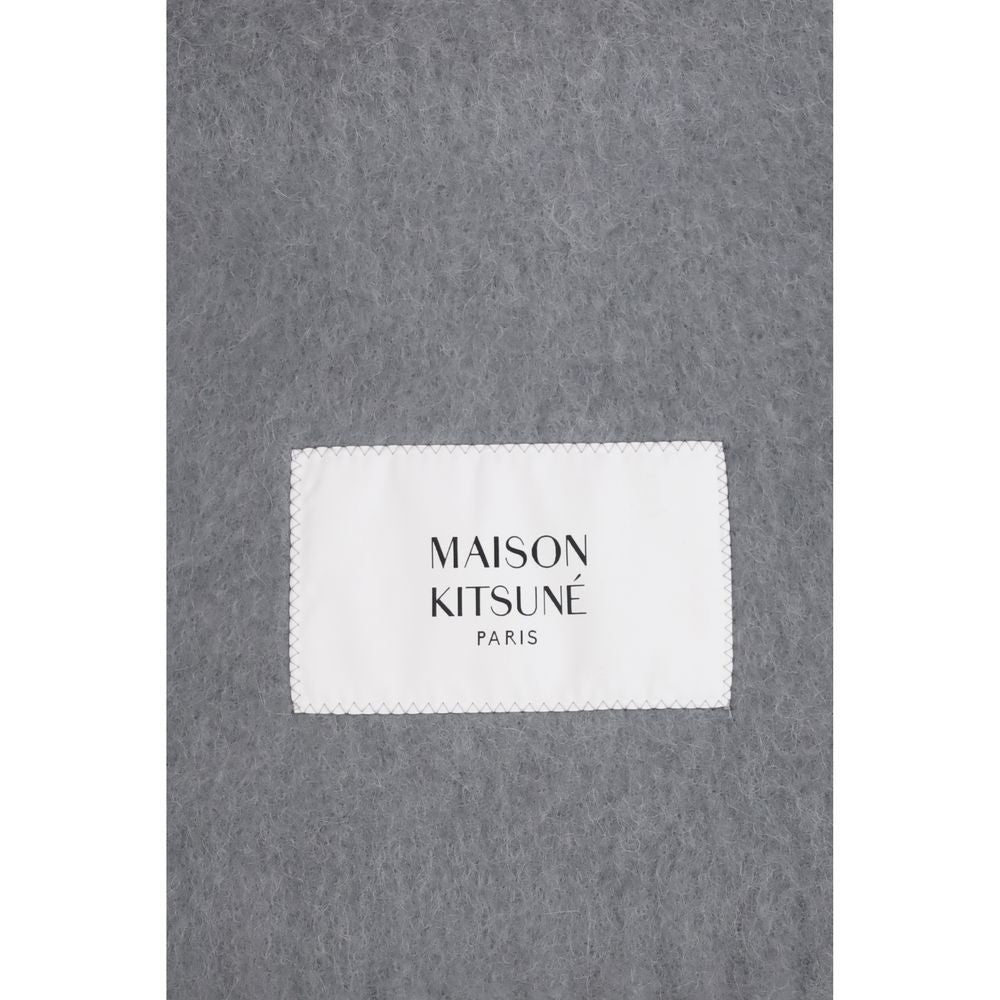 Elevate your style with the Maison Kitsuné Gray Alpaca Vicugna Pacos Scarf, a luxurious accessory crafted from 100% alpaca, embodying sophistication and warmth for every occasion.