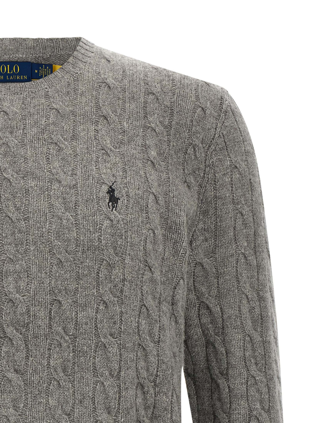 Indulge in the exquisite Polo Ralph Lauren Gray Wool Cardigan, a masterful blend of luxury and comfort, perfect for those who appreciate timeless elegance and refined style.