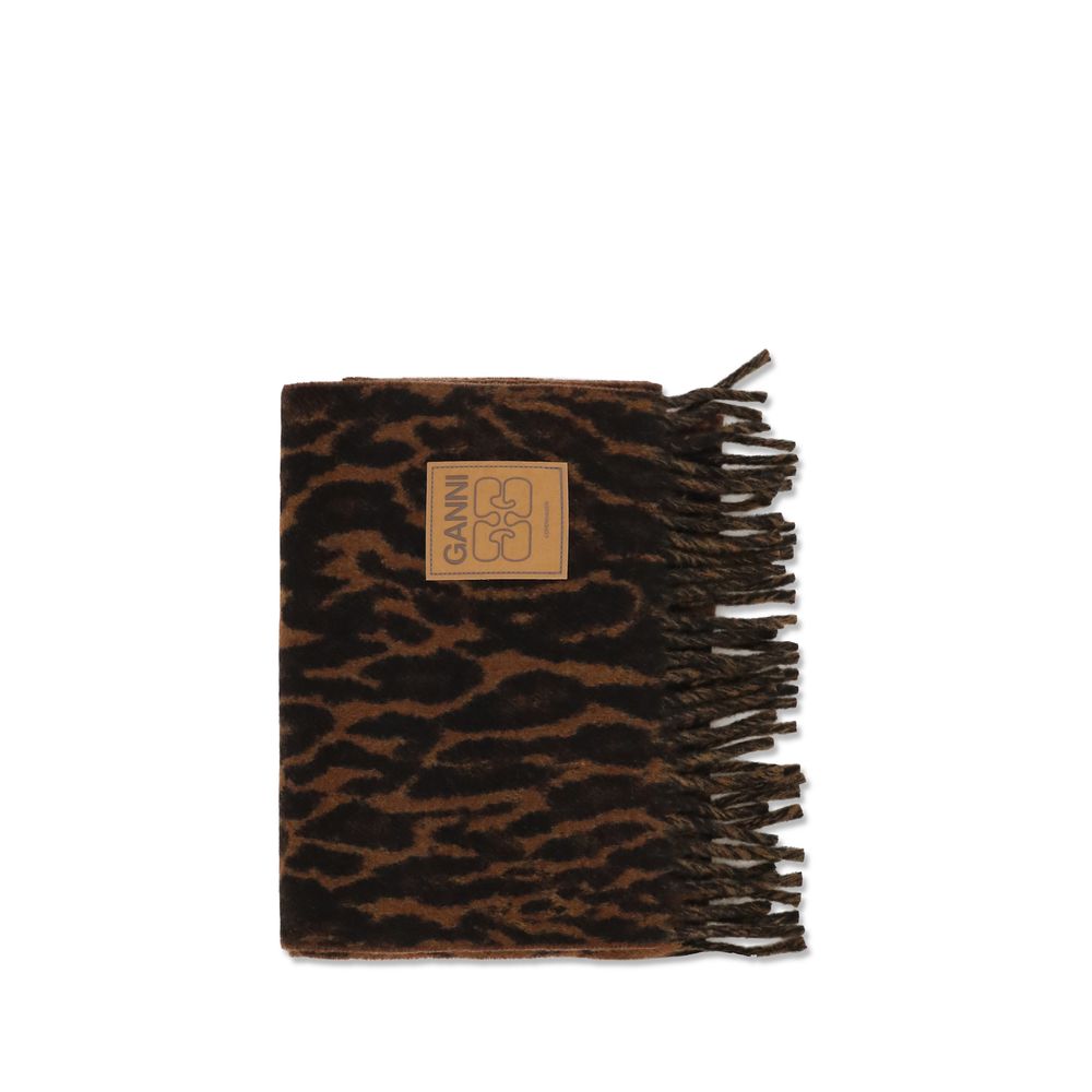 Indulge in the Ganni Brown Wool Oves Aries Scarf, a luxurious 100% Ovis Aries wool piece from the AW26 collection, featuring an exquisite leopard print that elevates any ensemble.