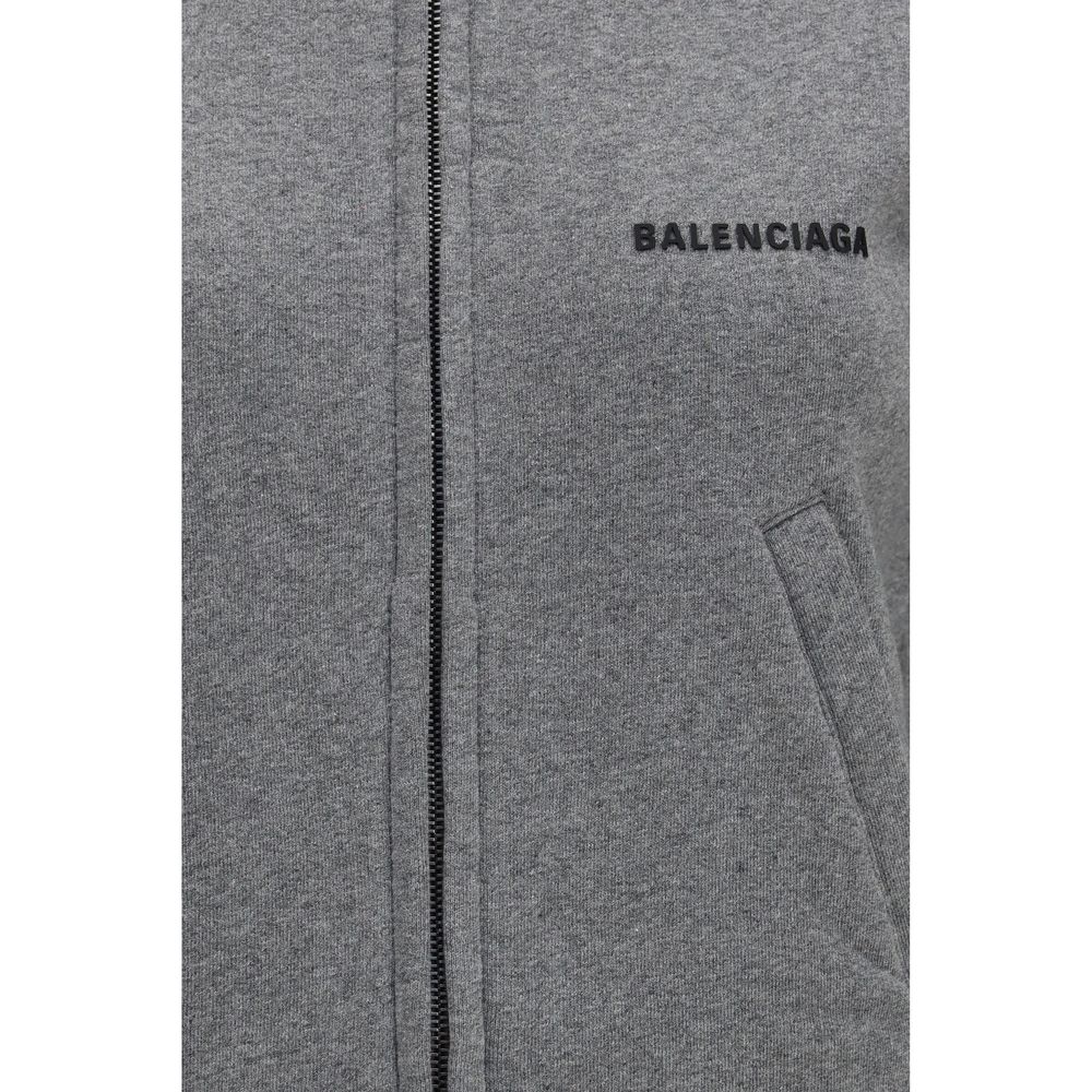 Indulge in the Balenciaga Gray Cotton Sweatshirt, a fusion of luxe cotton and modern elegance, perfect for those who embody sophistication and style.