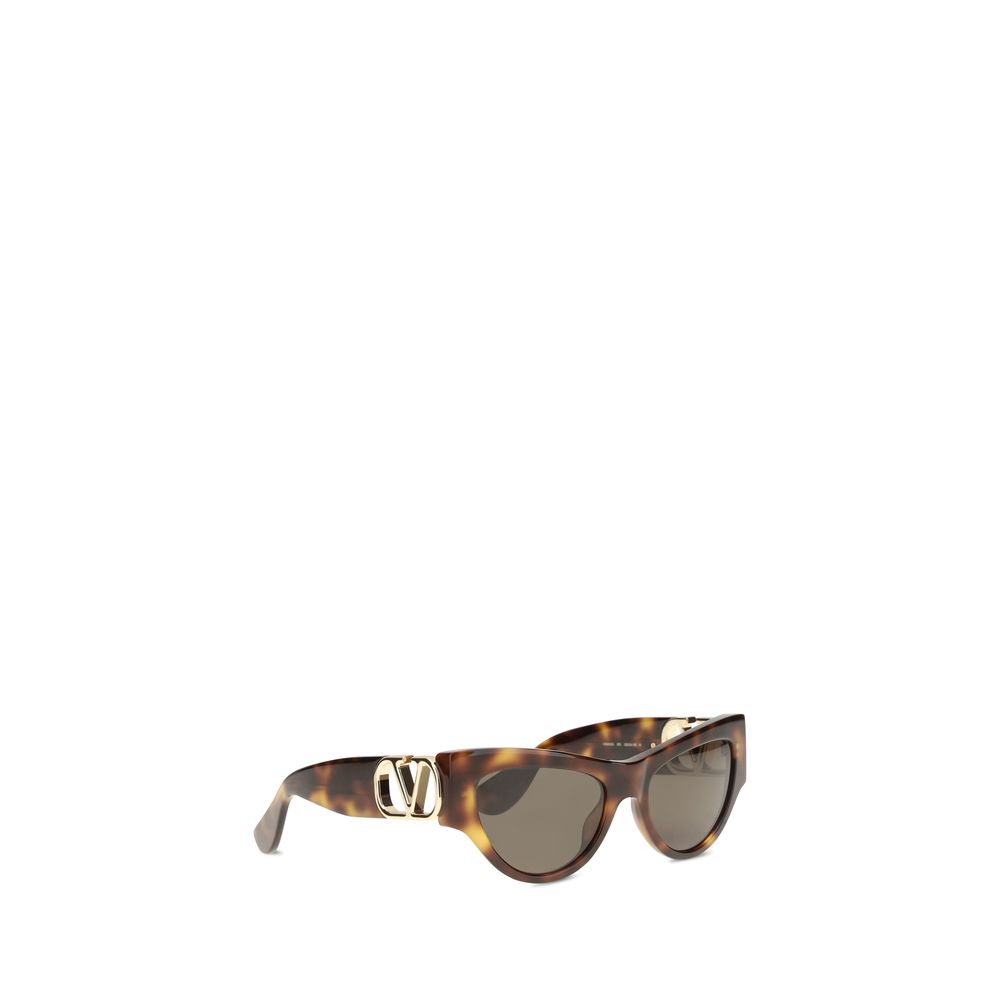 Indulge in the allure of Valentino Garavani Brown Acetate Sunglasses, where exquisite craftsmanship meets sustainable luxury, elevating your style with timeless elegance.