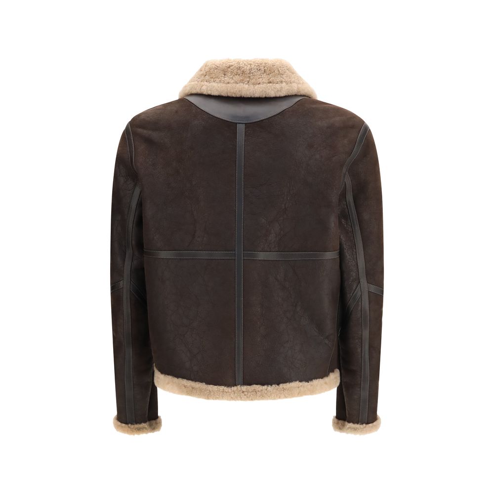 Indulge in the exquisite craftsmanship of the Belstaff Brown Lamb Leather Full-Length Jacket, a timeless piece that redefines luxury with its premium shearling and distinctive design.