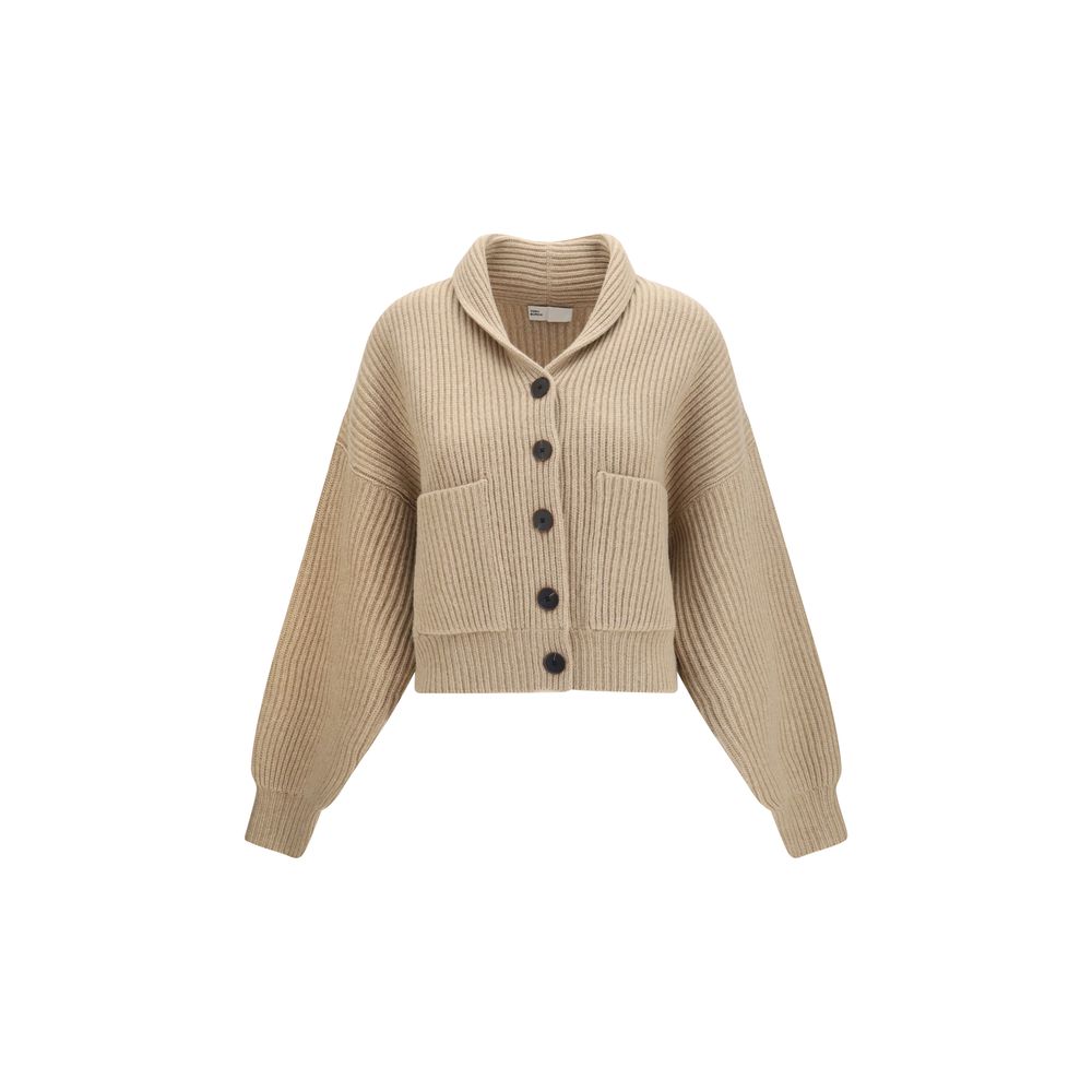 Indulge in the Tory Burch Beige Wool Oves Aries Cardigan, a masterpiece of merino wool knit, exuding elegance with its cropped silhouette and refined detailing for the discerning individual.