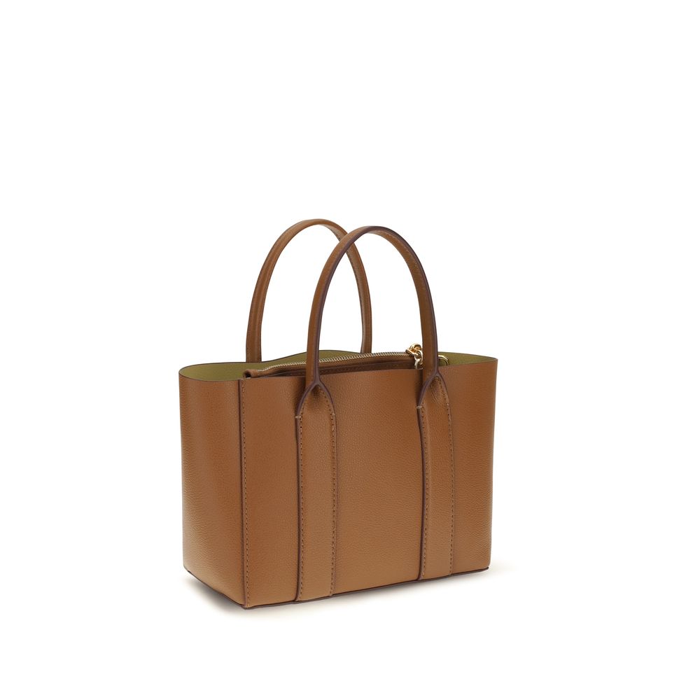 Indulge in the elegance of the Marc Jacobs Brown Calf Leather Bos Taurus Shoulder Bag, a timeless piece crafted for the discerning individual seeking everyday luxury.