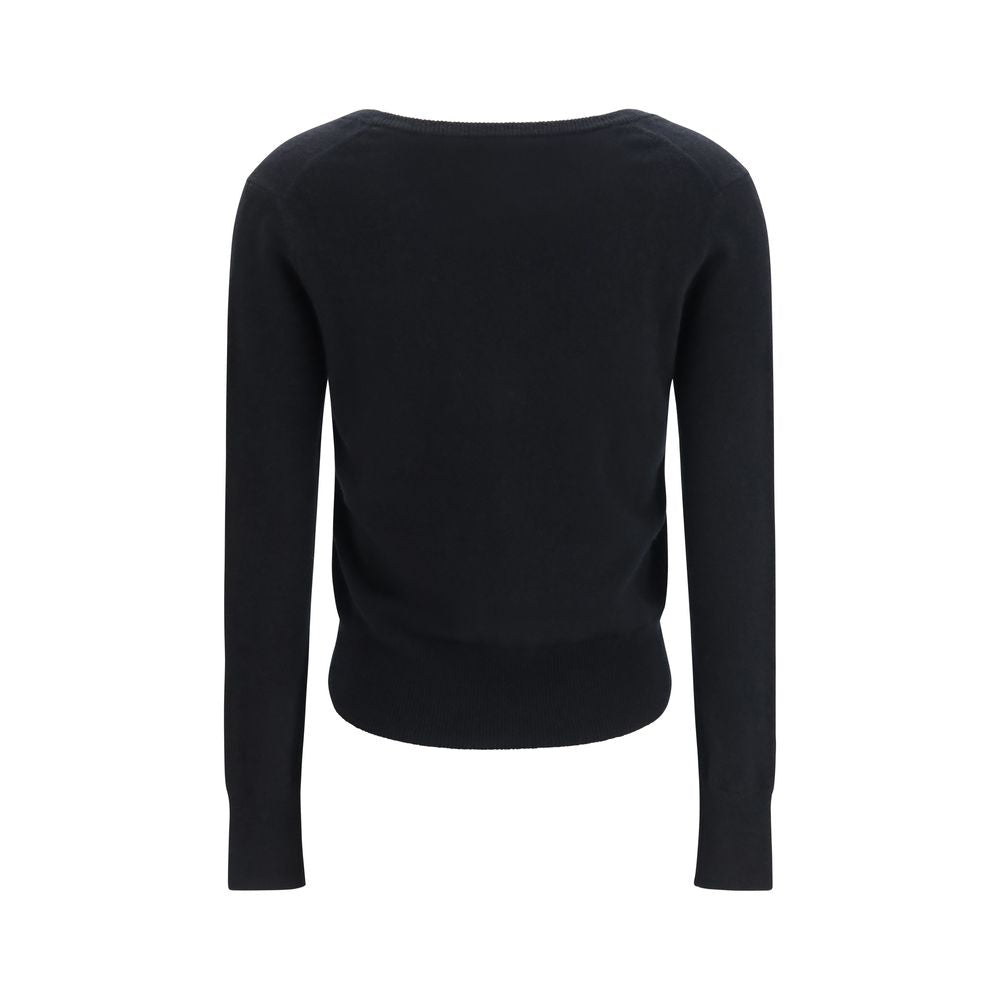 Experience the allure of the Extreme Cashmere Black Cashmere Cardigan from the AW26 collection, crafted from 100% cashmere for unparalleled luxury and elegance.